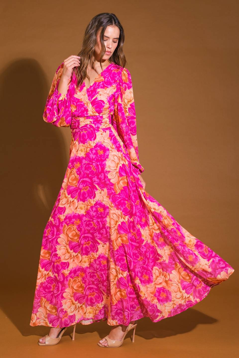 CUNNINGHAM FLORALS WOVEN MAXI DRESS
A printed woven maxi dress featuring surplice neckline, long sleeve, ruched waist band and back zipper closure
Details:
Self : 100% Polyester
Lining : 100% Polyester
Size & Fit
- Model is 5`9" And Wearing Size Small
- Measurements Taken From Size Small
- Approx. Length: 60"