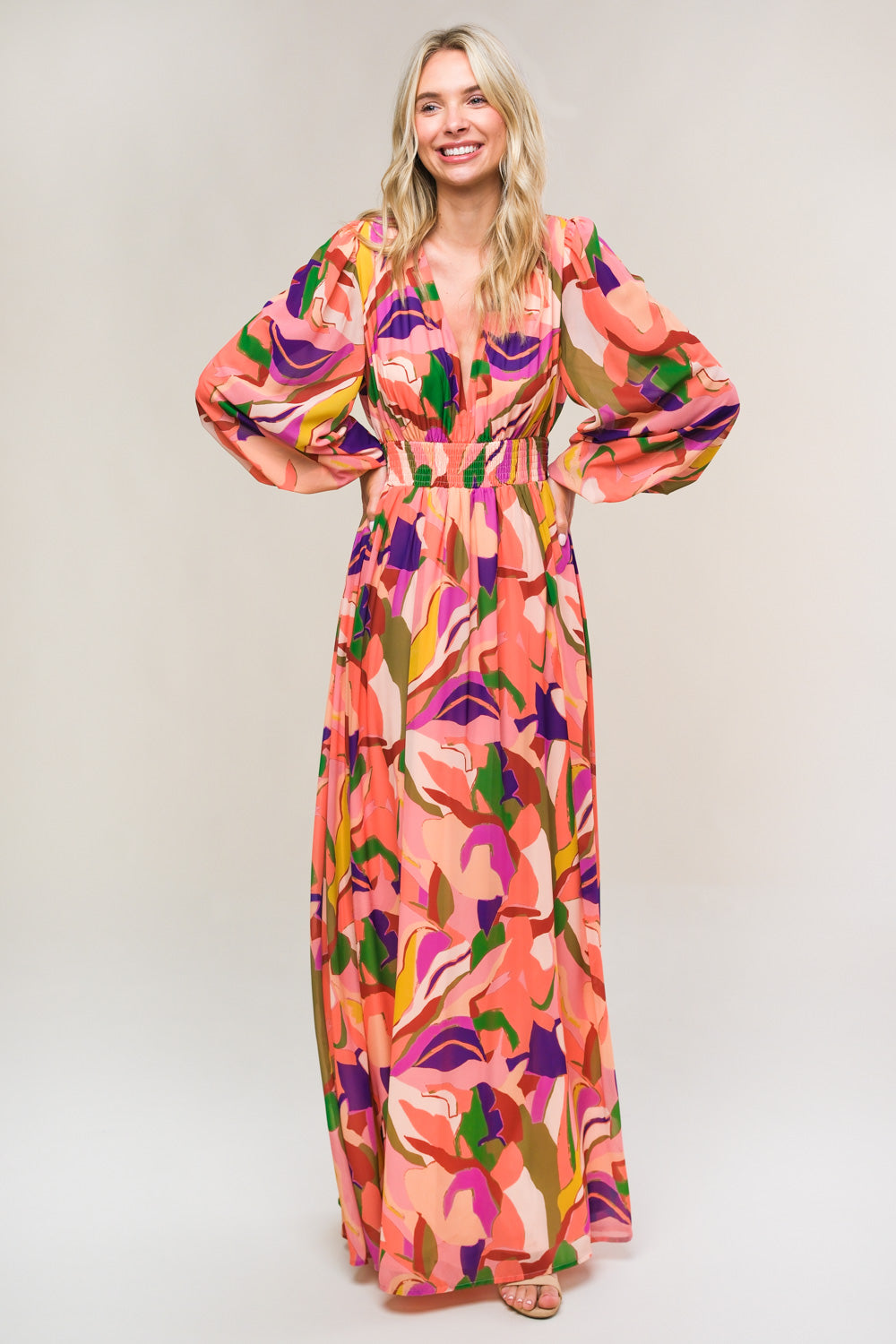 A printed woven maxi dress featuring plunging V neckline, long blouson sleeve with smocked cuff, smocked waist band and full skirt
Details:
Self : 100% Polyester
Lining: 100% Polyester
Size & Fit
- Model is 5`7" And Wearing Size Small
- Measurements Taken From Size Small
- Approx. Length: 58"