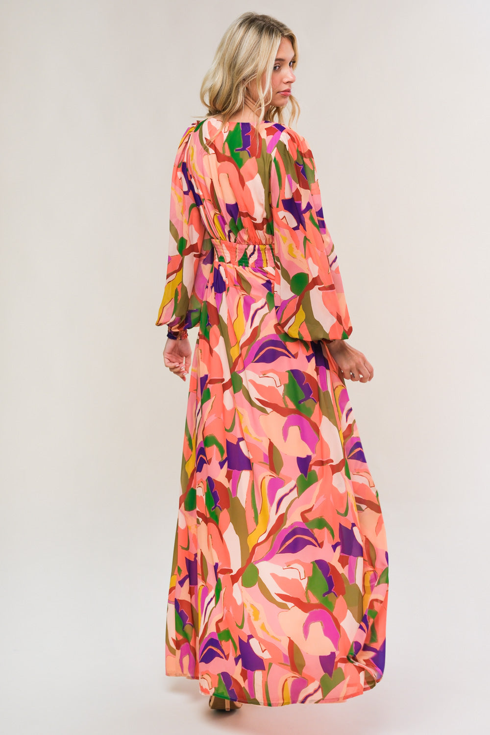 A printed woven maxi dress featuring plunging V neckline, long blouson sleeve with smocked cuff, smocked waist band and full skirt
Details:
Self : 100% Polyester
Lining: 100% Polyester
Size & Fit
- Model is 5`7" And Wearing Size Small
- Measurements Taken From Size Small
- Approx. Length: 58"