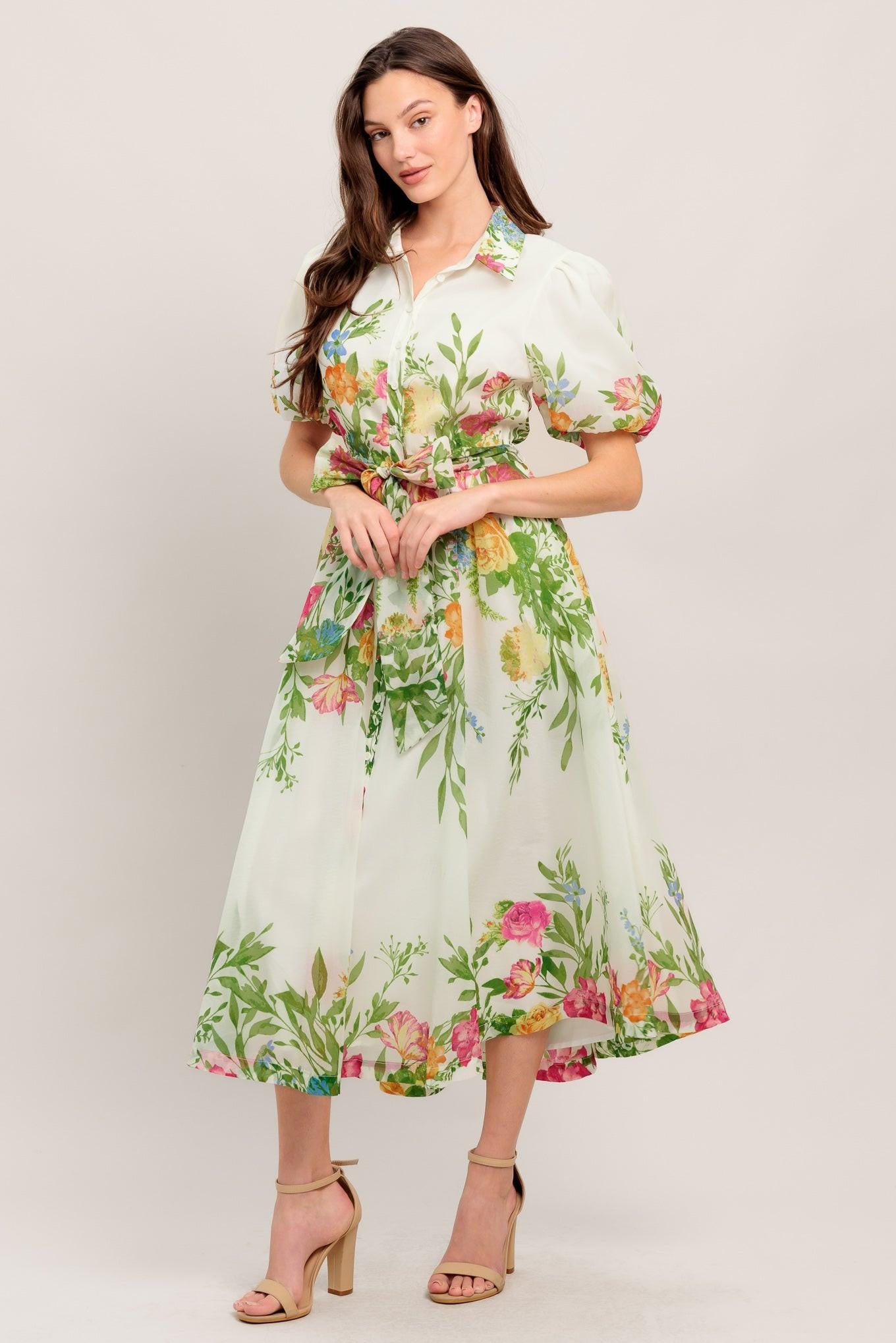A printed woven midi dress featuring shirt collar, button down, short puff sleeve, self sash tie and full skirt
Details:
Self : 100% Polyester
Lining : 100% Polyester
Size & Fit
- Model is 5`8" And Wearing Size Small
- Measurements Taken From Size Small
- Approx. Length: 50" FLYING TOMATO