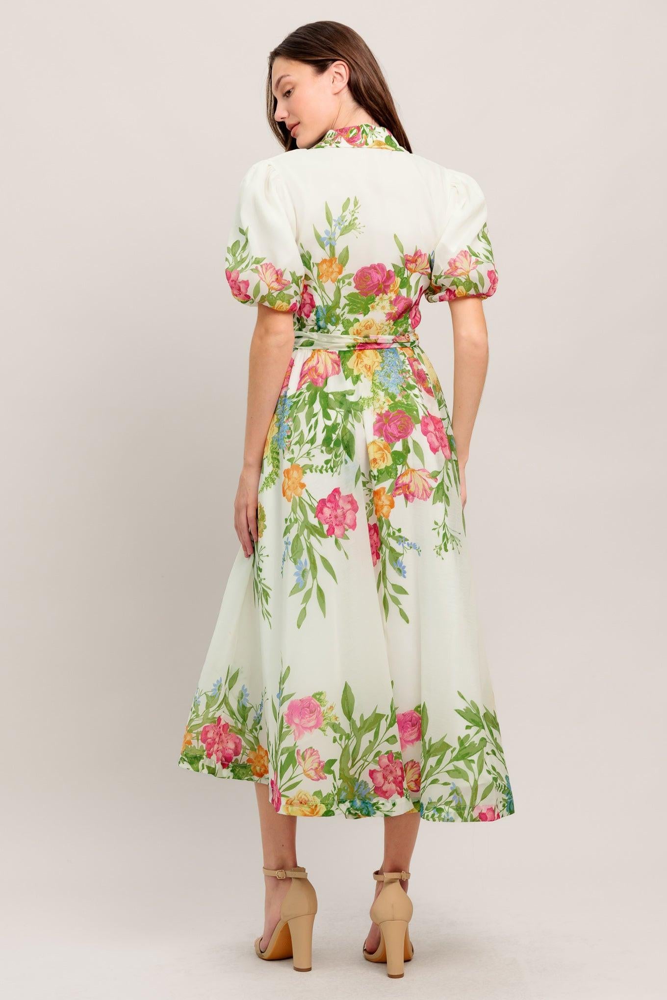 A printed woven midi dress featuring shirt collar, button down, short puff sleeve, self sash tie and full skirt
Details:
Self : 100% Polyester
Lining : 100% Polyester
Size & Fit
- Model is 5`8" And Wearing Size Small
- Measurements Taken From Size Small
- Approx. Length: 50" FLYING TOMATO