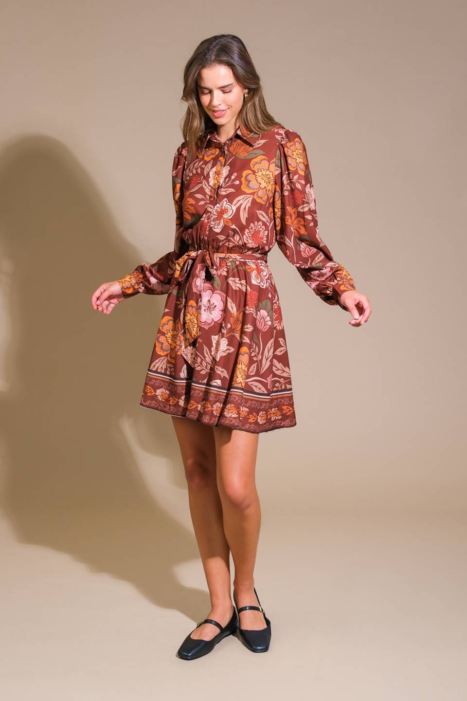 A printed woven mini dress featuring shirt collar, long sleeve, button down, elasticized waist, self sash tie and full skirt
Details
Self : 100% Polyester
Size & Fit
- Model is 5`9" and wearing size Small
- Measurements taken from size Small
- Approx. Length: 36"