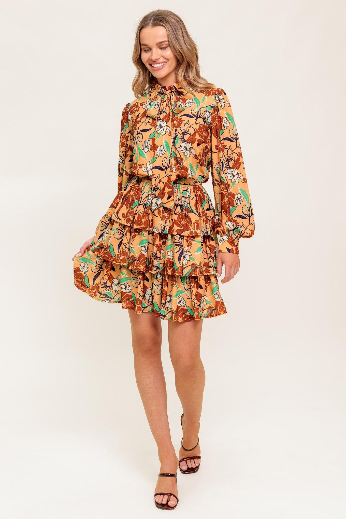 A printed woven mini dress featuring shirt collar, bow tie, buttun down, long sleeve, elasticized waist and layered skirt
Details:
Self : 100% Polyester
Lining : 100% Polyester
Size & Fit
- Model is 5`9" And Wearing Size Small
- Measurements Taken From Size Small
- Approx. Length: 36"