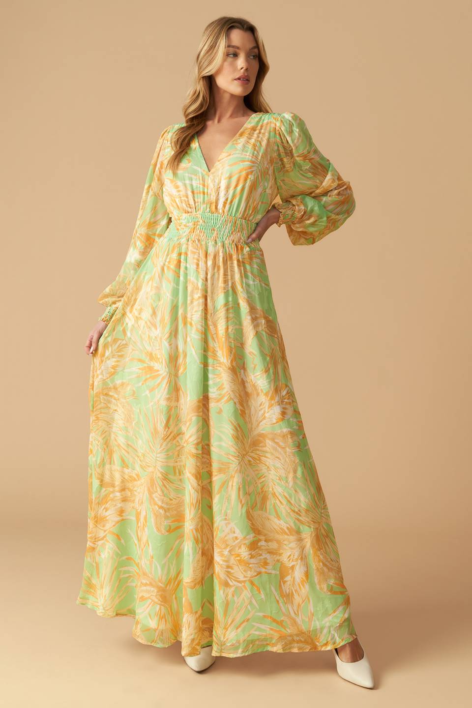 A printed woven maxi dress featuring V neckline, long sleeve with smocked cuff and smocked waistband
Details:
Self : 100% Polyester
Lining : 100% Polyester
Size & Fit
- Model is 5`10" And Wearing Size Small
- Measurements Taken From Size Small
- Approx. Length: 60"
