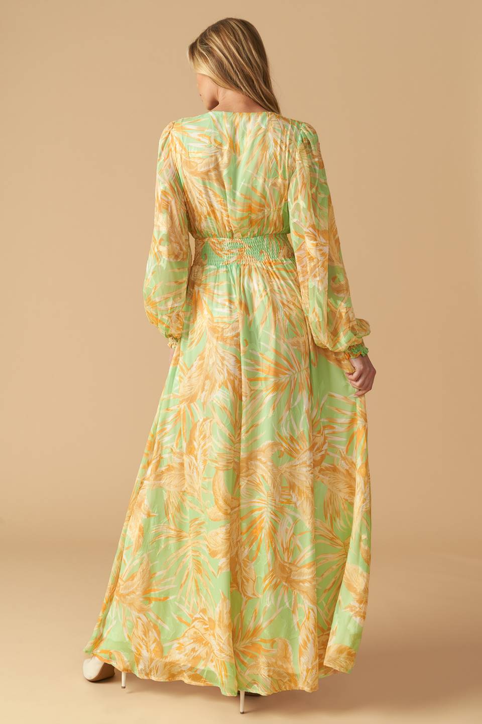 A printed woven maxi dress featuring V neckline, long sleeve with smocked cuff and smocked waistband
Details:
Self : 100% Polyester
Lining : 100% Polyester
Size & Fit
- Model is 5`10" And Wearing Size Small
- Measurements Taken From Size Small
- Approx. Length: 60"
