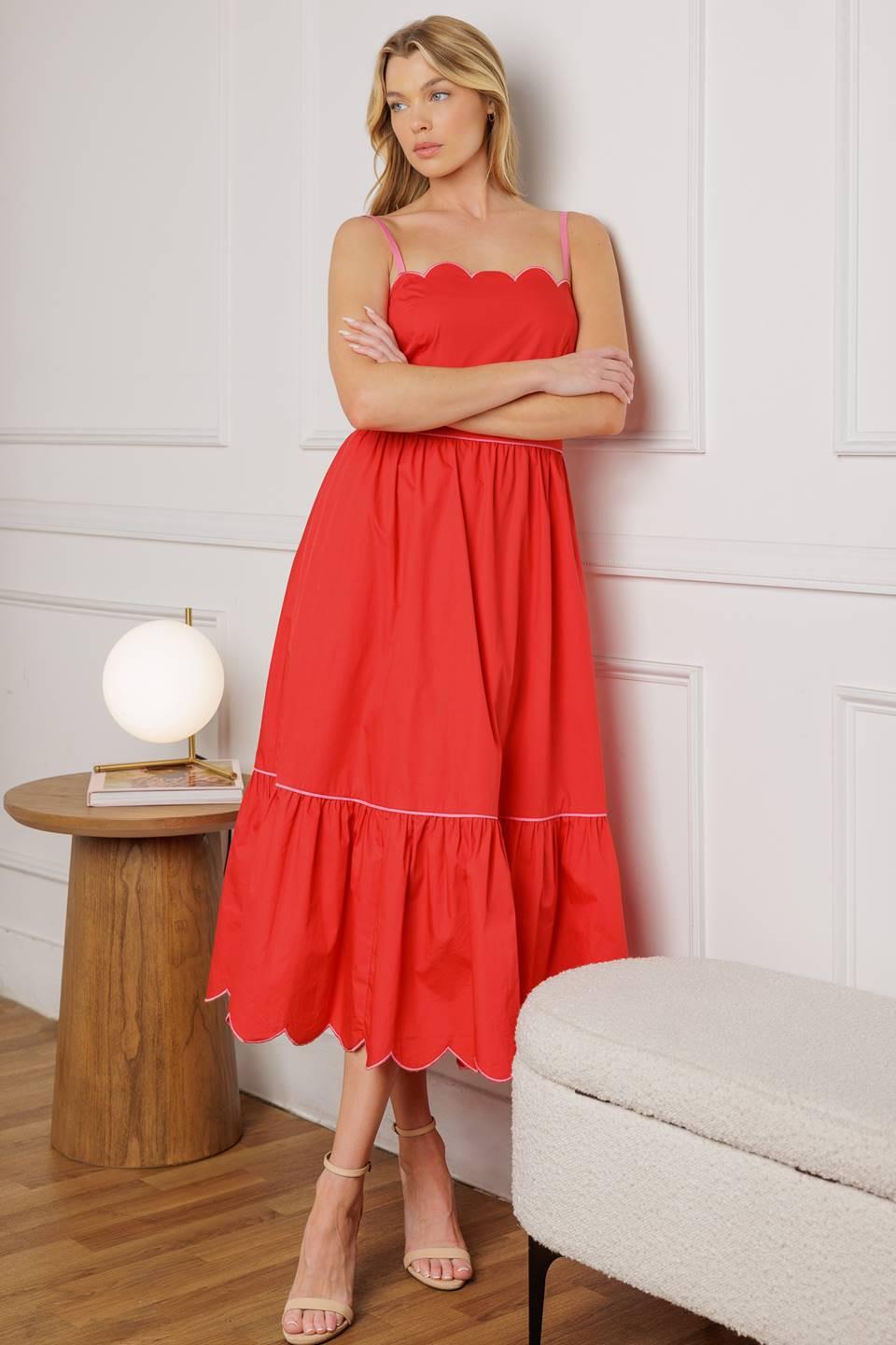 A solid woven midi dress featuring a scalloped straight neckline, shoulder strap, ruffled hemline, and back zipper closure from Flying Tomato