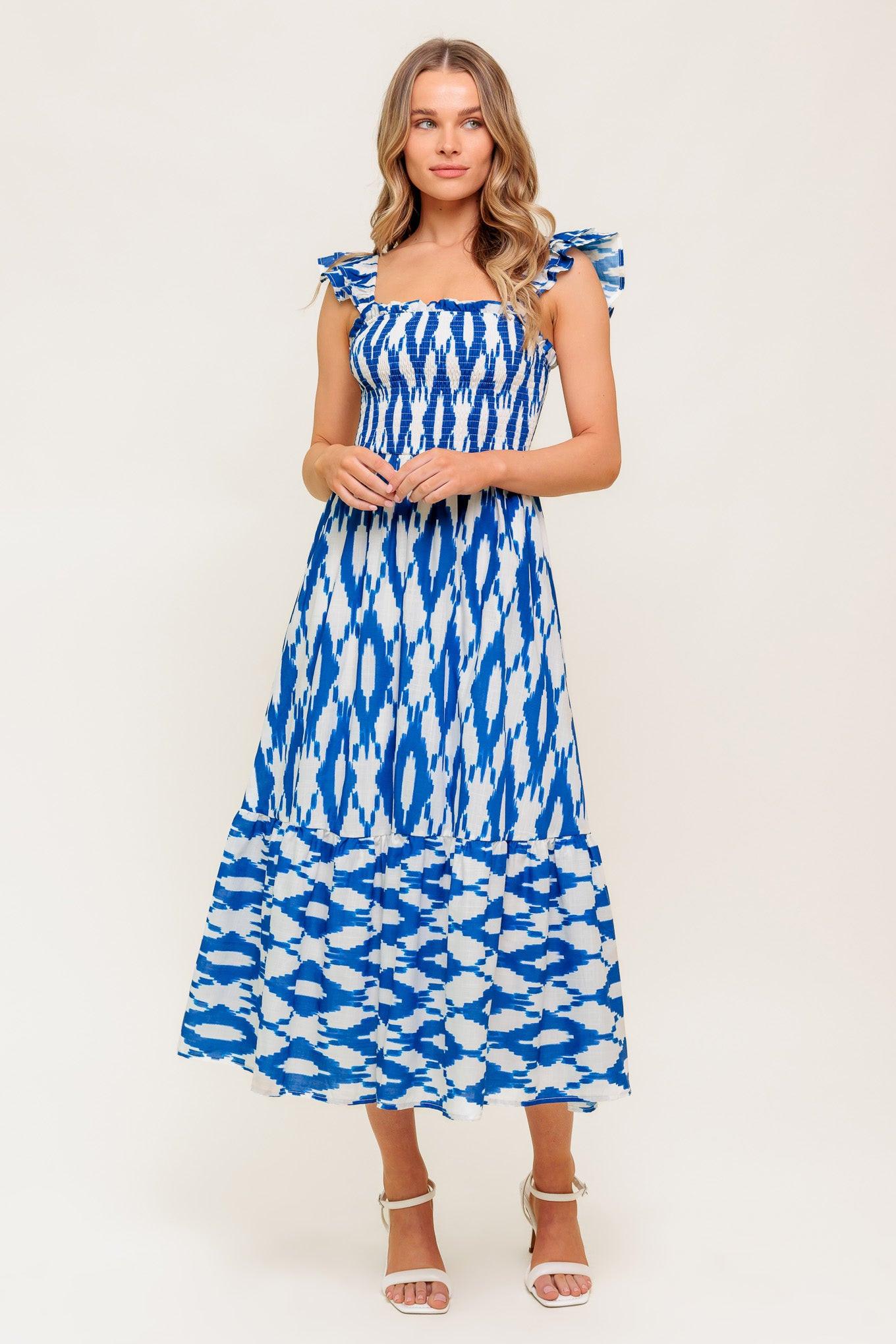 LOST IN THE DETAILS WOVEN MIDI DRESS.