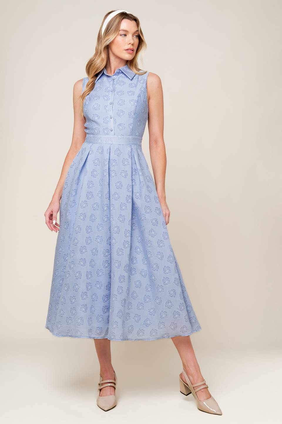 A slate blue woven midi dress featuring collar, button down, inverted pleat full skirt and side zipper closure.