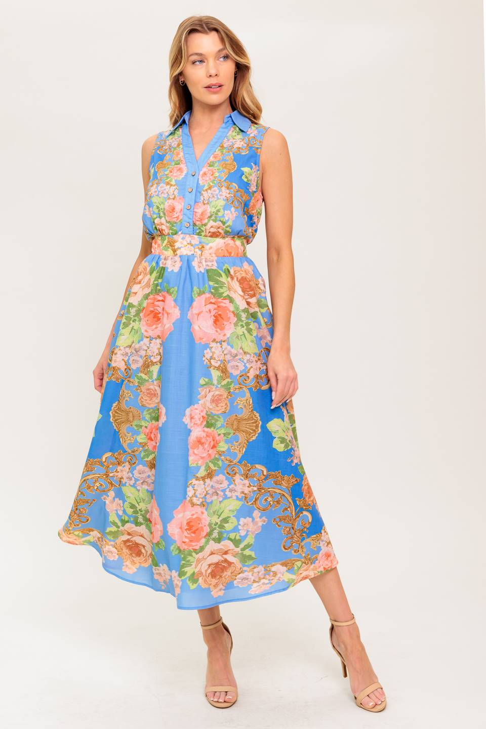 A printed woven midi dress featuring collar, V neckline, button down, sleeveless, full skirt and smocked back waistband