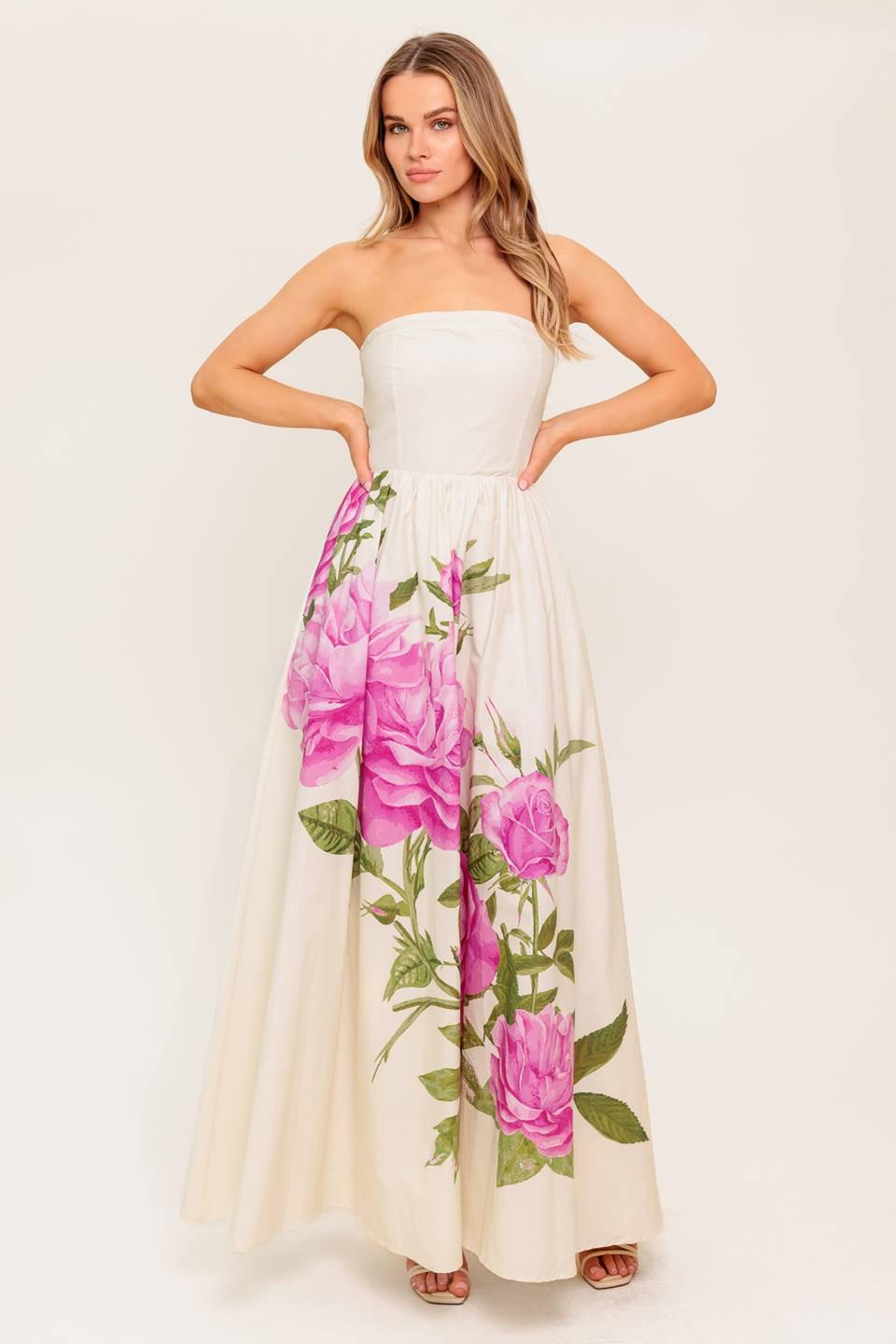 A printed woven maxi dress featuring strapless, full skirt and back zipper closure.