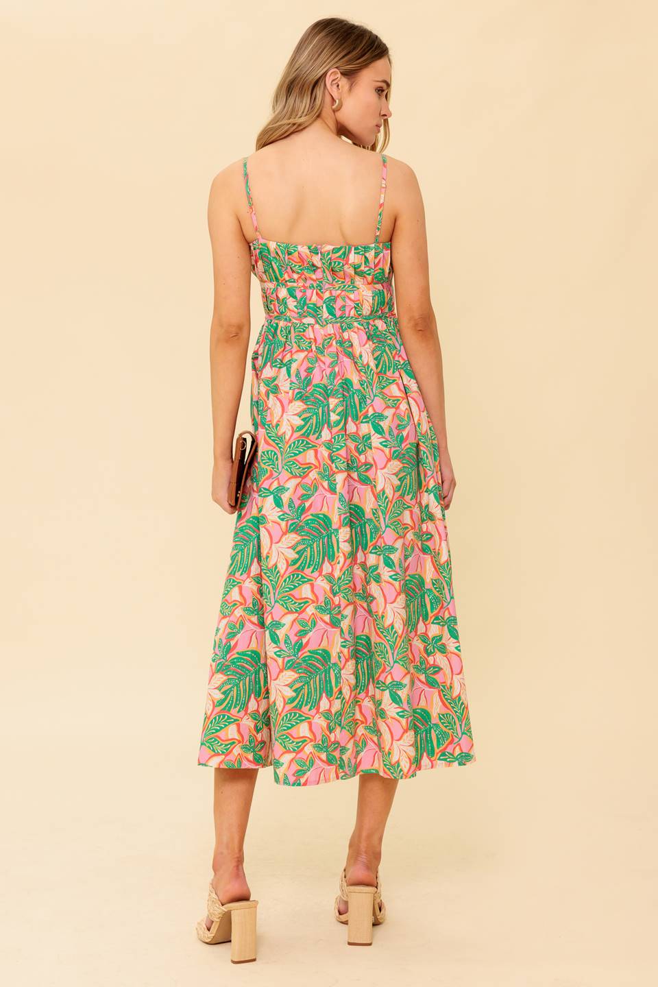 A printed woven midi dress featuring pleated bodice, straight neckline with shoulder strap, full skirt and back zipper closure