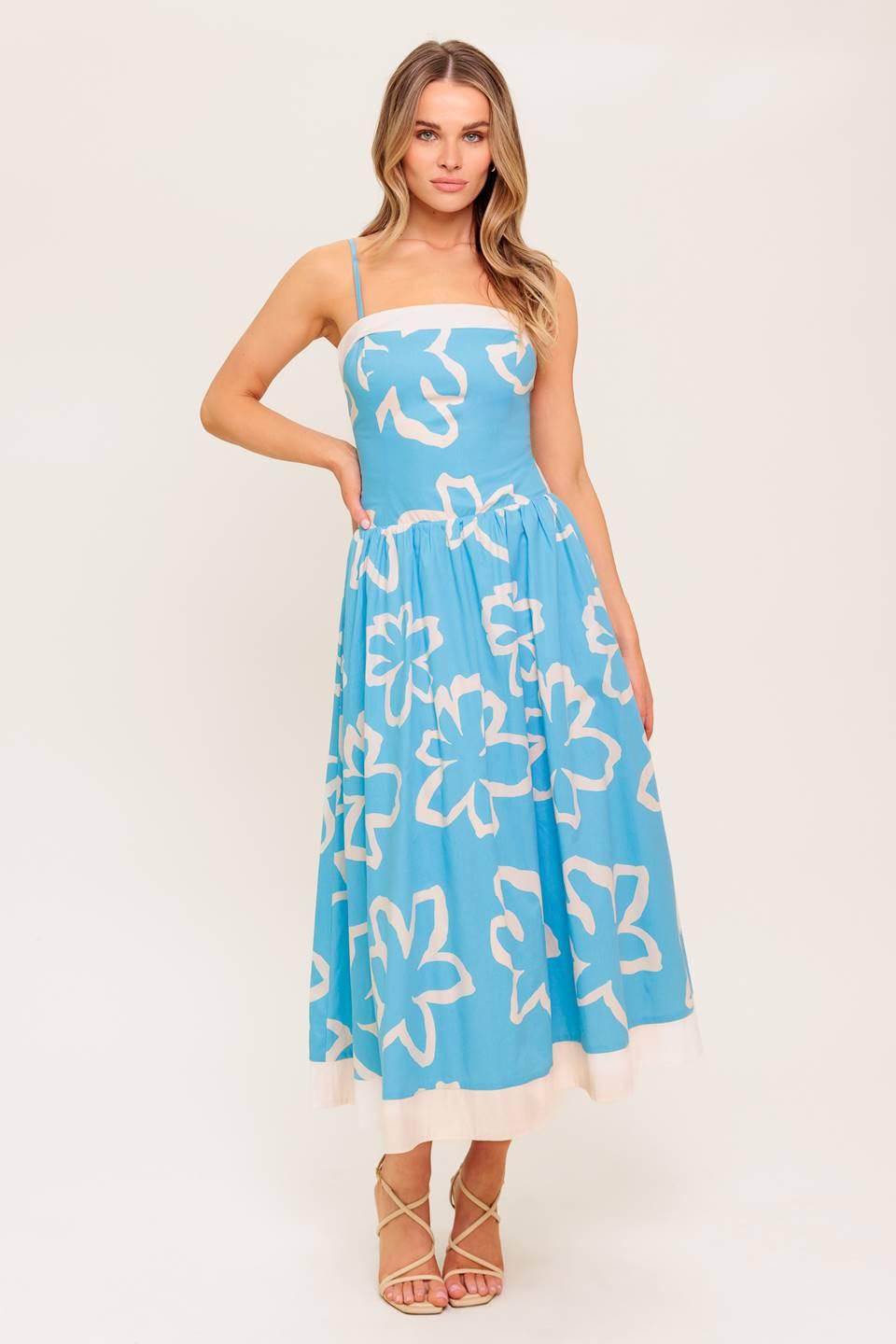 A printed woven midi dress featuring straight neckline, contrasting border and smocked back bodice.