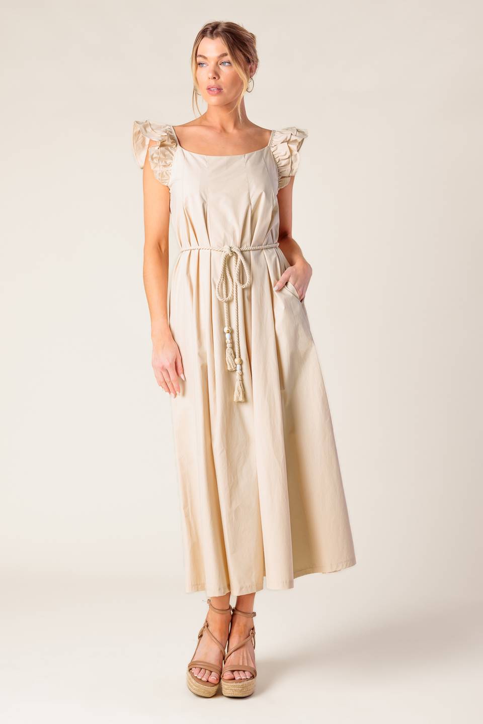 A solid woven midi dress featuring square neckline, double ruffle sleeve and rope belt