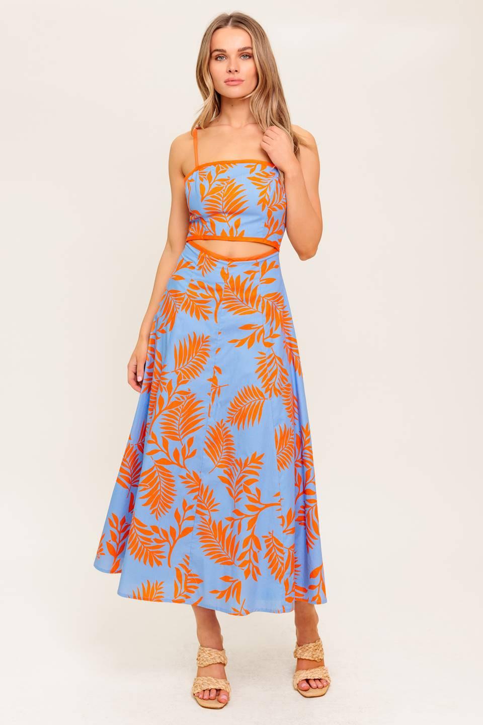 A printed woven midi dress featuring straight neckline, straps, front waist cut out, circle skirt and back zipper closure.