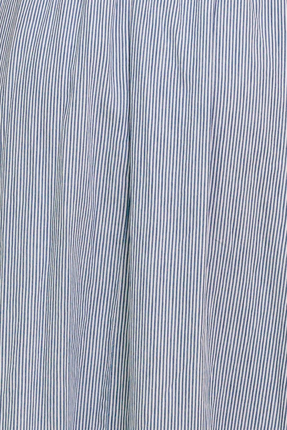 A striped woven midi dress featuring round neckline, front bow ties, short puff sleeve, waist yoke, full skirt and back zipper closure.