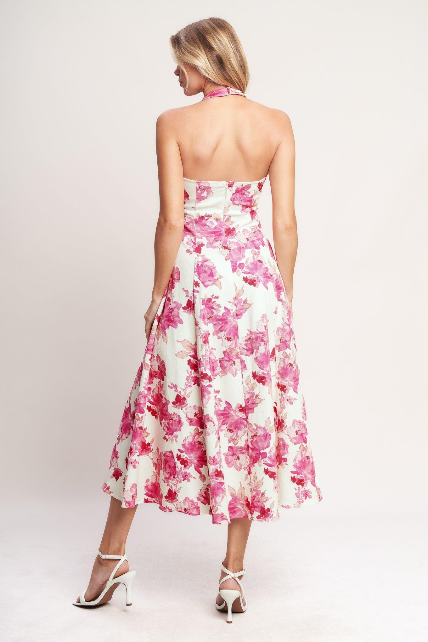 A printed woven halter midi dress featuring V neckline with back button closure, circle skirt, bare back and zipper closure
Details:
Self : 97% Cotton 3% Spandex
Size & Fit
- Model is 5`8" And Wearing Size Small
- Measurements Taken From Size Small
- Approx. Length: 50"