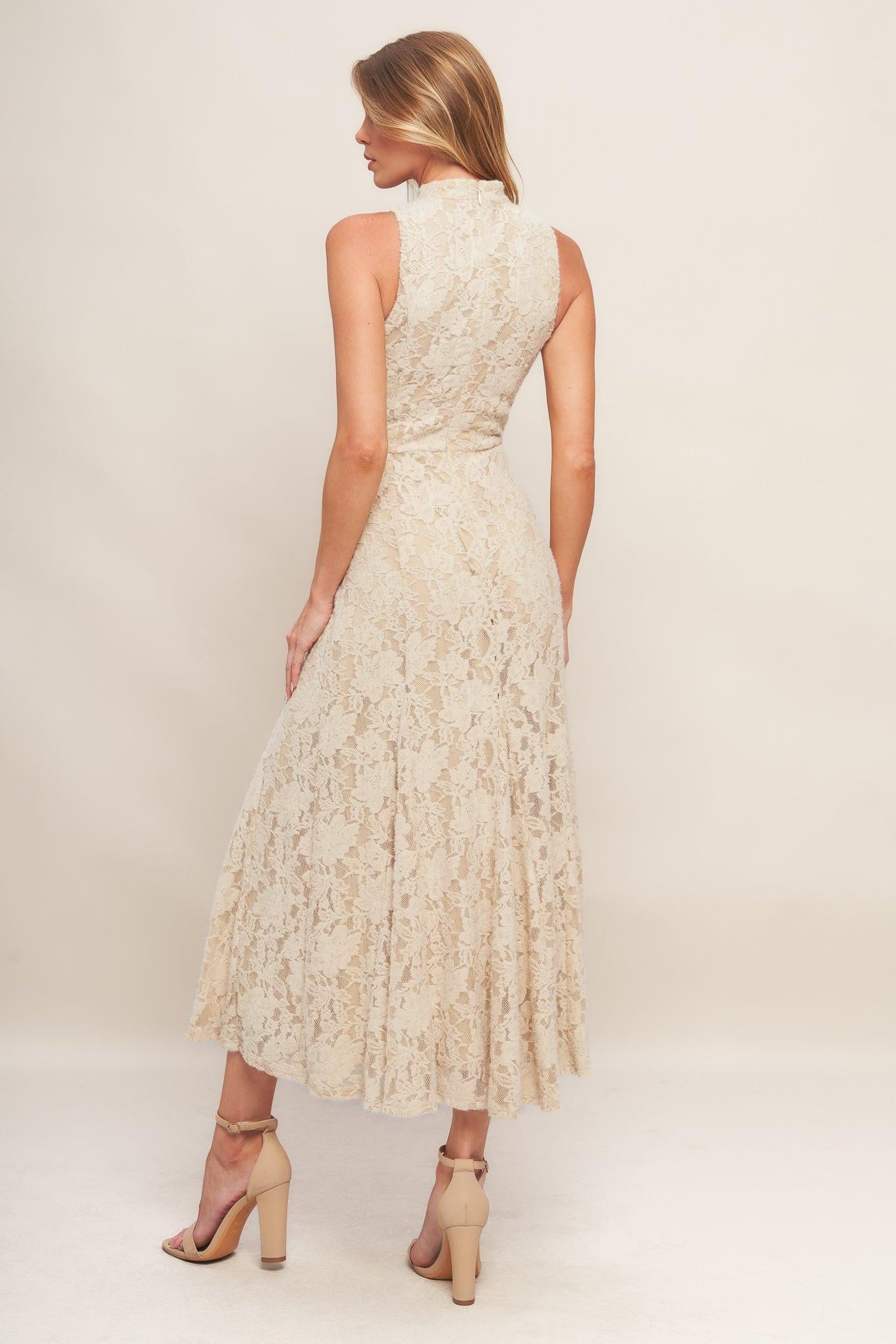 A stretch lace midi dress featuring mock neckline, sleeveless and back zipper closure