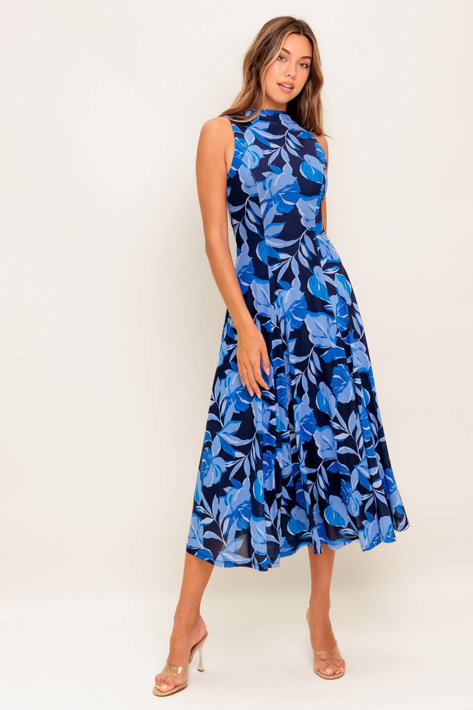 A printed power mesh midi dress featuring high neckline, sleeveless and circle skirt