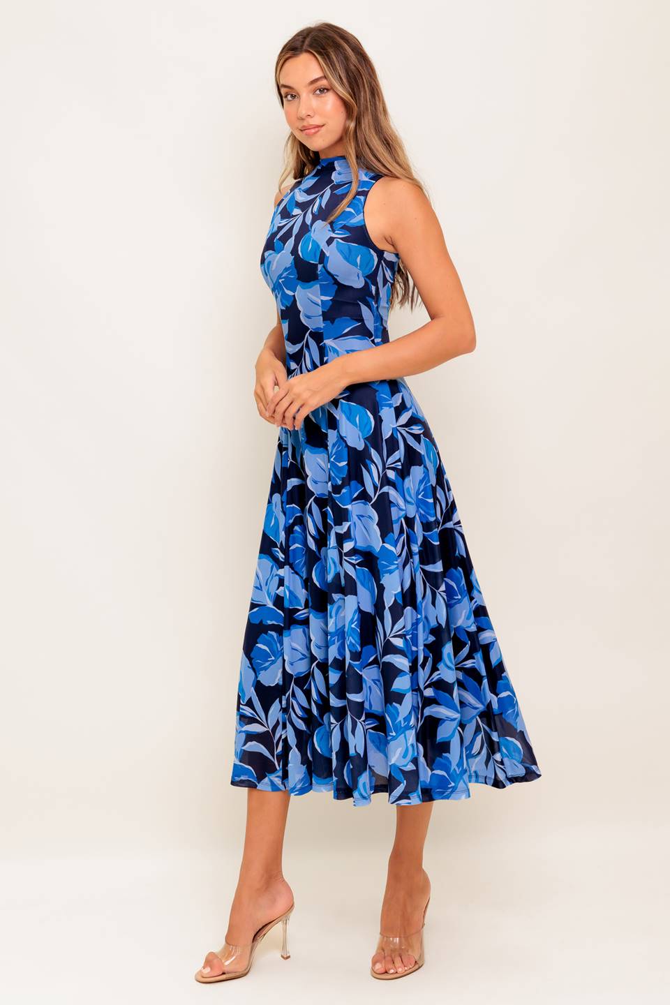 A printed power mesh midi dress featuring high neckline, sleeveless and circle skirt