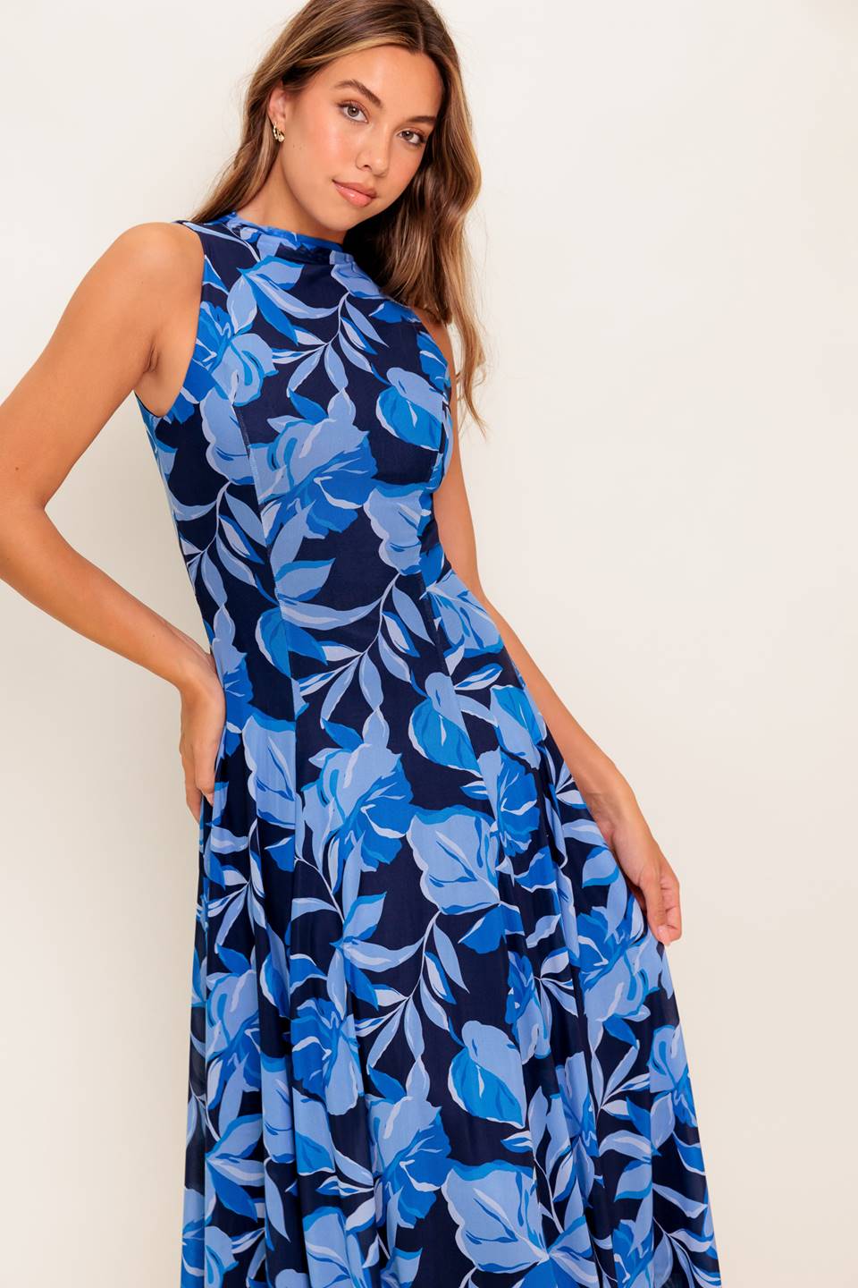 A printed power mesh midi dress featuring high neckline, sleeveless and circle skirt
