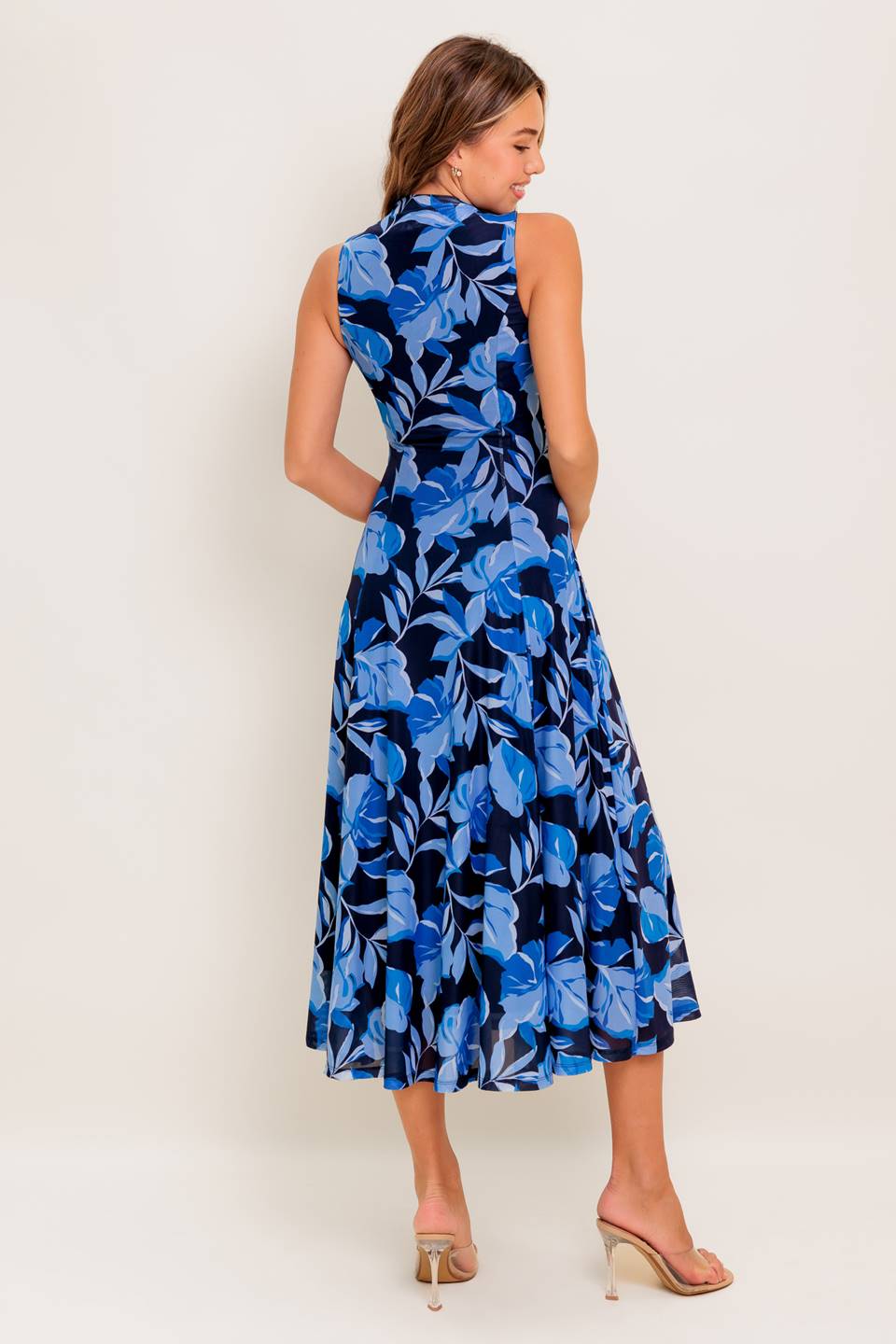 A printed power mesh midi dress featuring high neckline, sleeveless and circle skirt