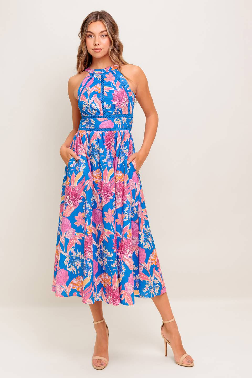 A printed woven midi dress featuring halter neckline, lace inset detail, full skirt, bare back with tie and smocked back waistband