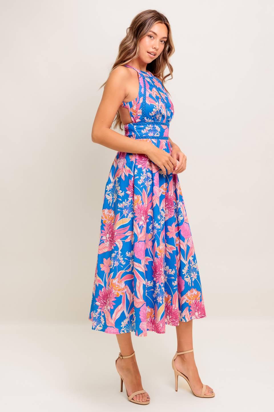 A printed woven midi dress featuring halter neckline, lace inset detail, full skirt, bare back with tie and smocked back waistband
