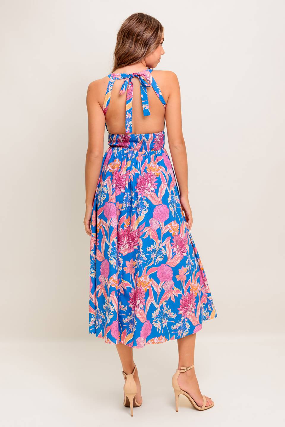 A printed woven midi dress featuring halter neckline, lace inset detail, full skirt, bare back with tie and smocked back waistband
