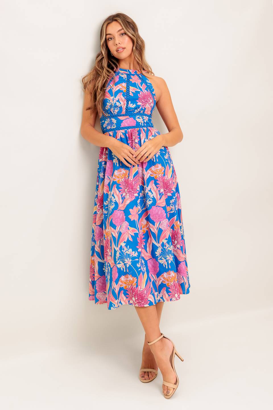 A printed woven midi dress featuring halter neckline, lace inset detail, full skirt, bare back with tie and smocked back waistband