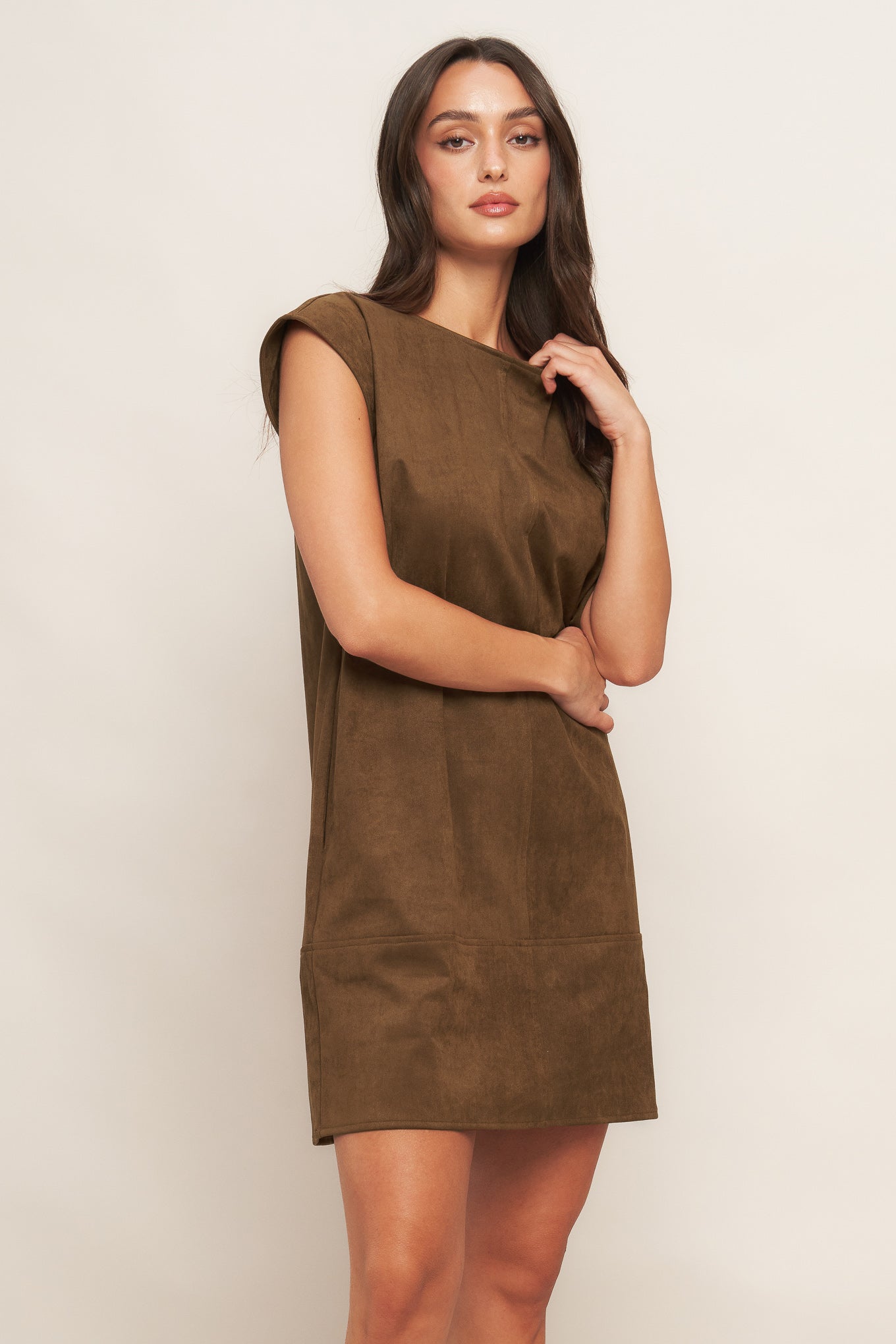 A faux suede midi shift dress featuring round neckline, cap sleeve and back neck tie closure