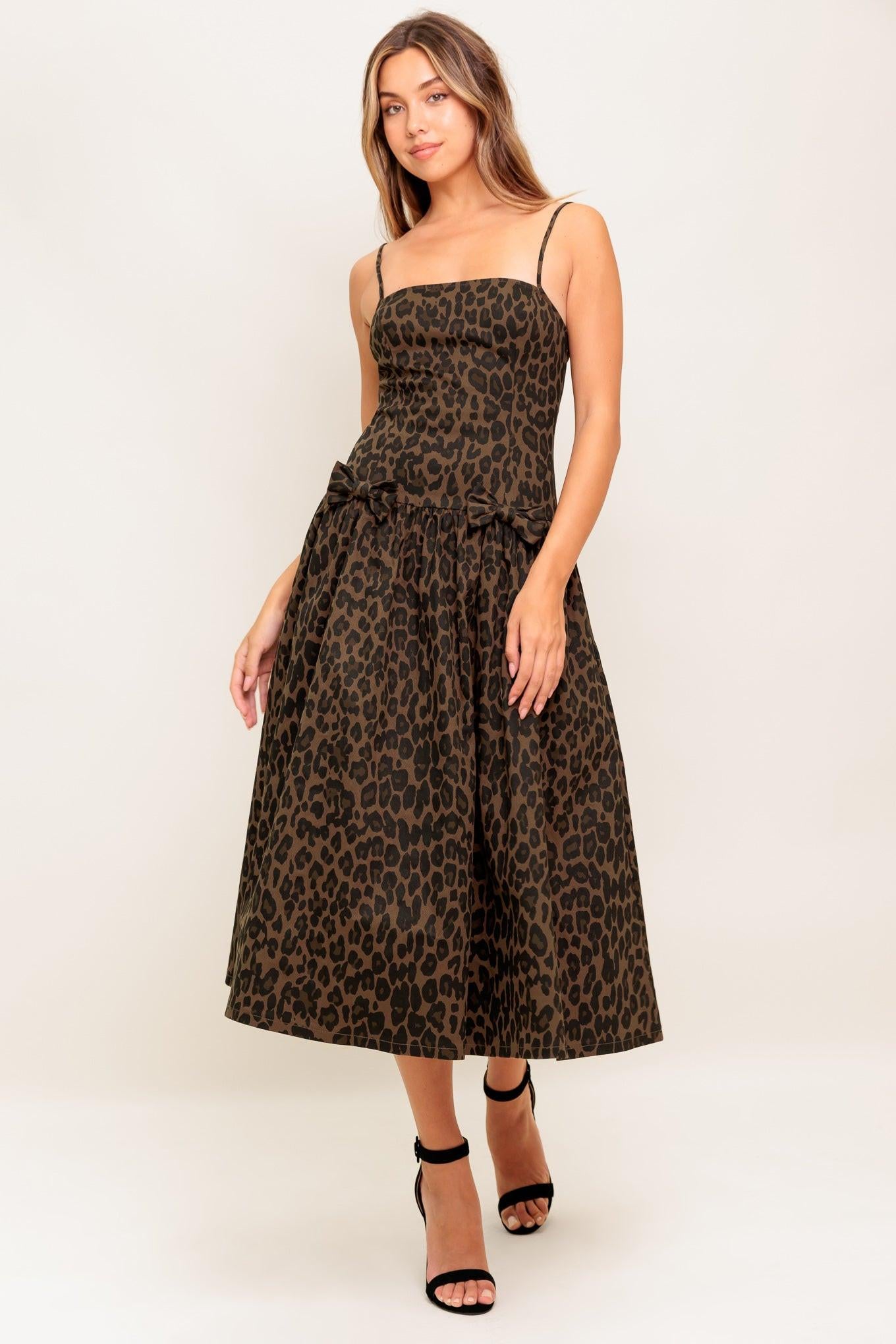 WALK SOFT, STRIKE STRONG LEOPARD WOVEN MIDI DRESS.
