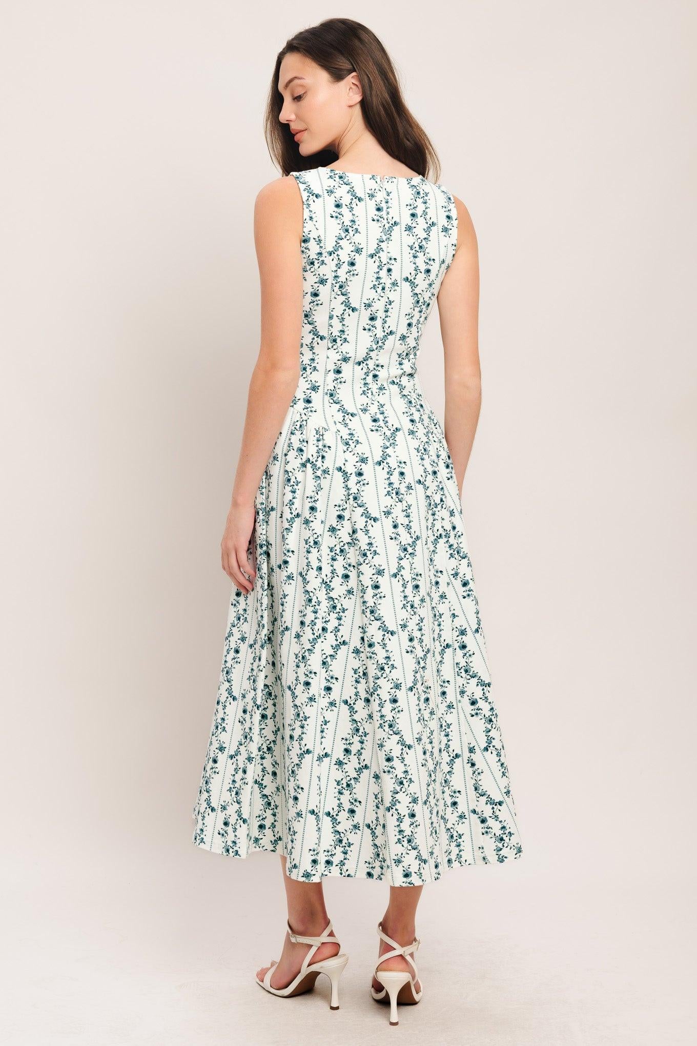 A printed woven midi dress featuring round neckline, sleeveless, side shirred full skirt and back zipper closure
Details:
Self : 97% Cotton 3% Spandex
Size & Fit
- Model is 5`8" And Wearing Size Small
- Measurements Taken From Size Small
- Approx. Length: 50"