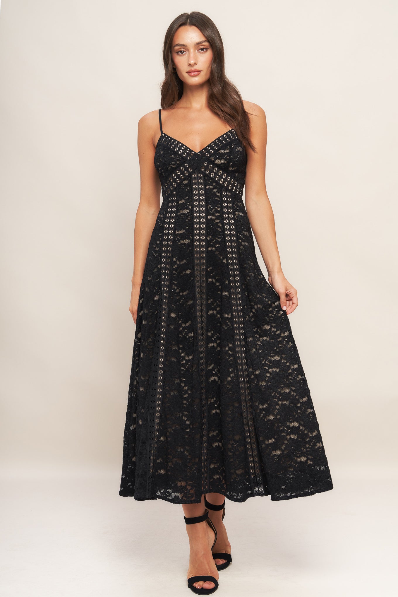 A woven lace midi dress featuring cami top, lace inset, circle skirt and back zipper closure