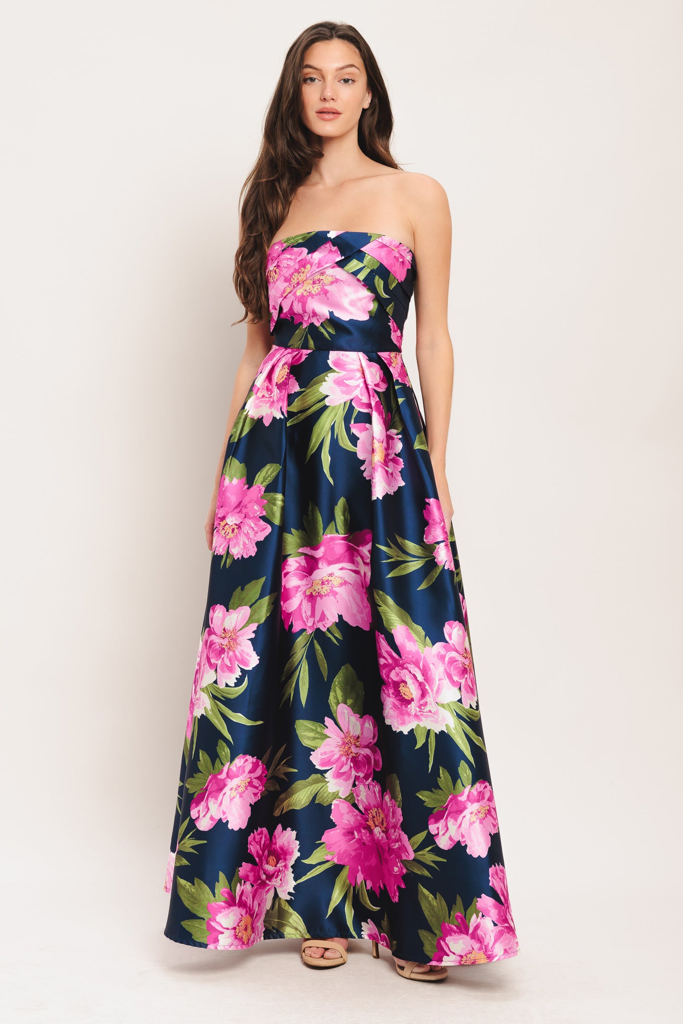 A printed woven maxi dress featuring strapless, full skirt and back zipper closure
Details:
Self: 100% Polyester
Lining: 100% Polyester
Size & Fit
-Model is 5`8" And Wearing Size Small
-Measurements Taken From Size Small
-Approx. Length: 53"