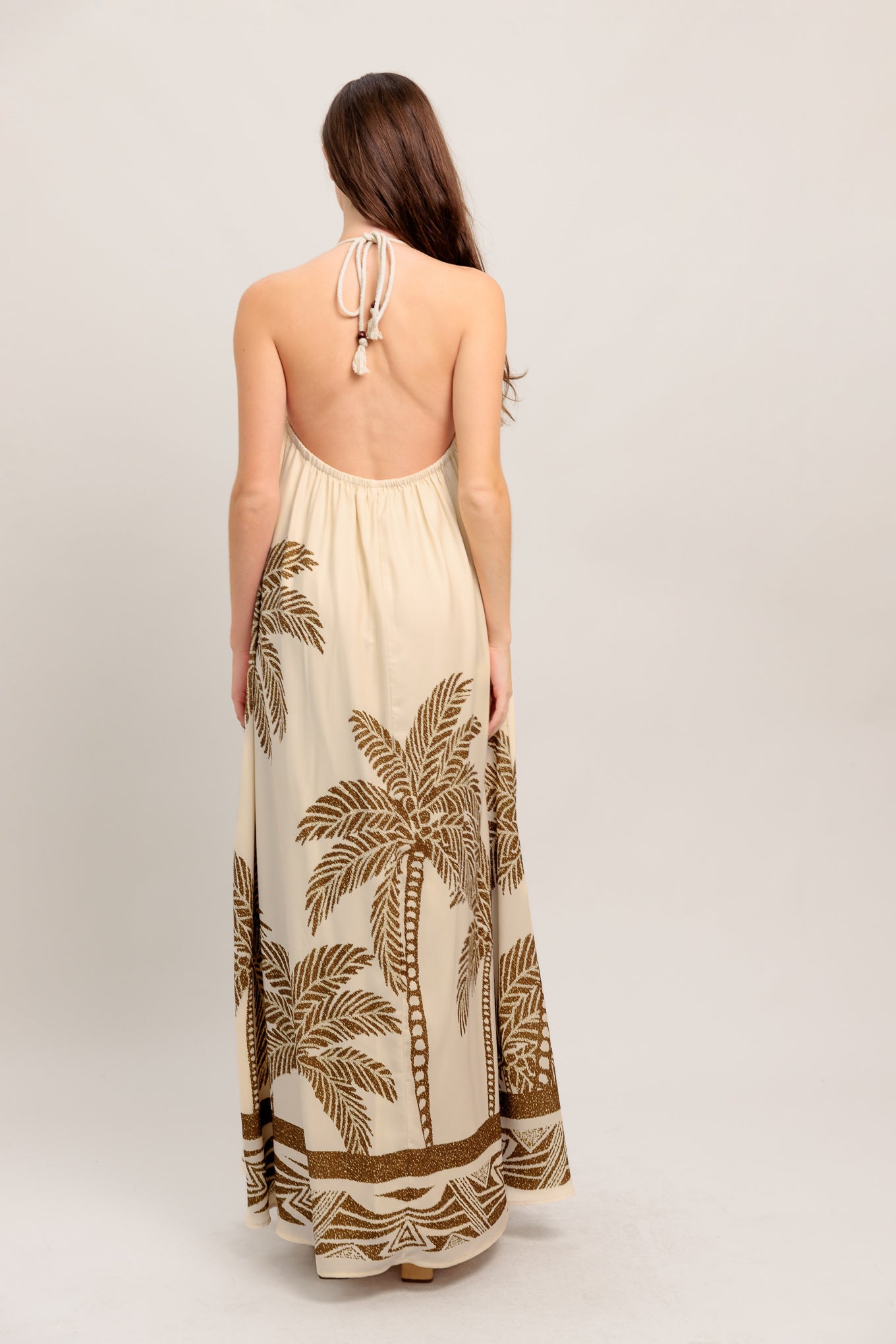 A printed woven maxi dress featuring halter neckline with braided tie and plunging back with elastic
Details:
Self : 100% Polyester
Lining : 100% Polyester
Size & Fit
- Model is 5`8" And Wearing Size Small
- Measurements Taken From Size Small
- Approx. Length: 58" Flying Tomato