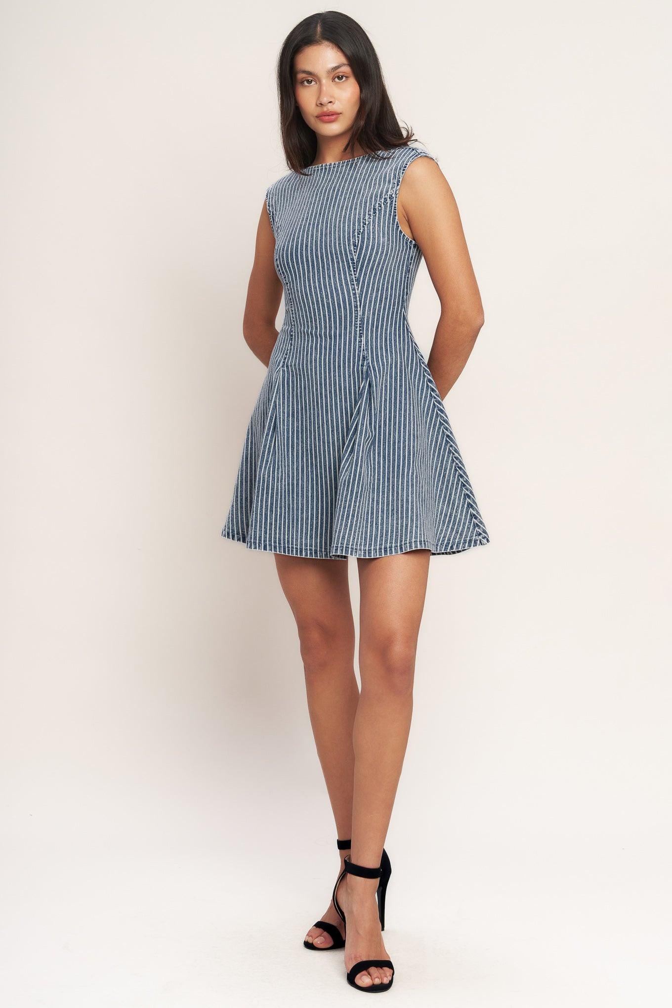 A striped denim mini dress featuring round neckline, sleeveless, circle skirt, cut out back and button zipper closure
Details:
Self : 65% Cotton, 33% Polyester, 2% Spandex
Size & Fit
- Model is 5`8" And Wearing Size Small
- Measurements Taken From Size Small
- Approx. Length: 33" Flying Tomato