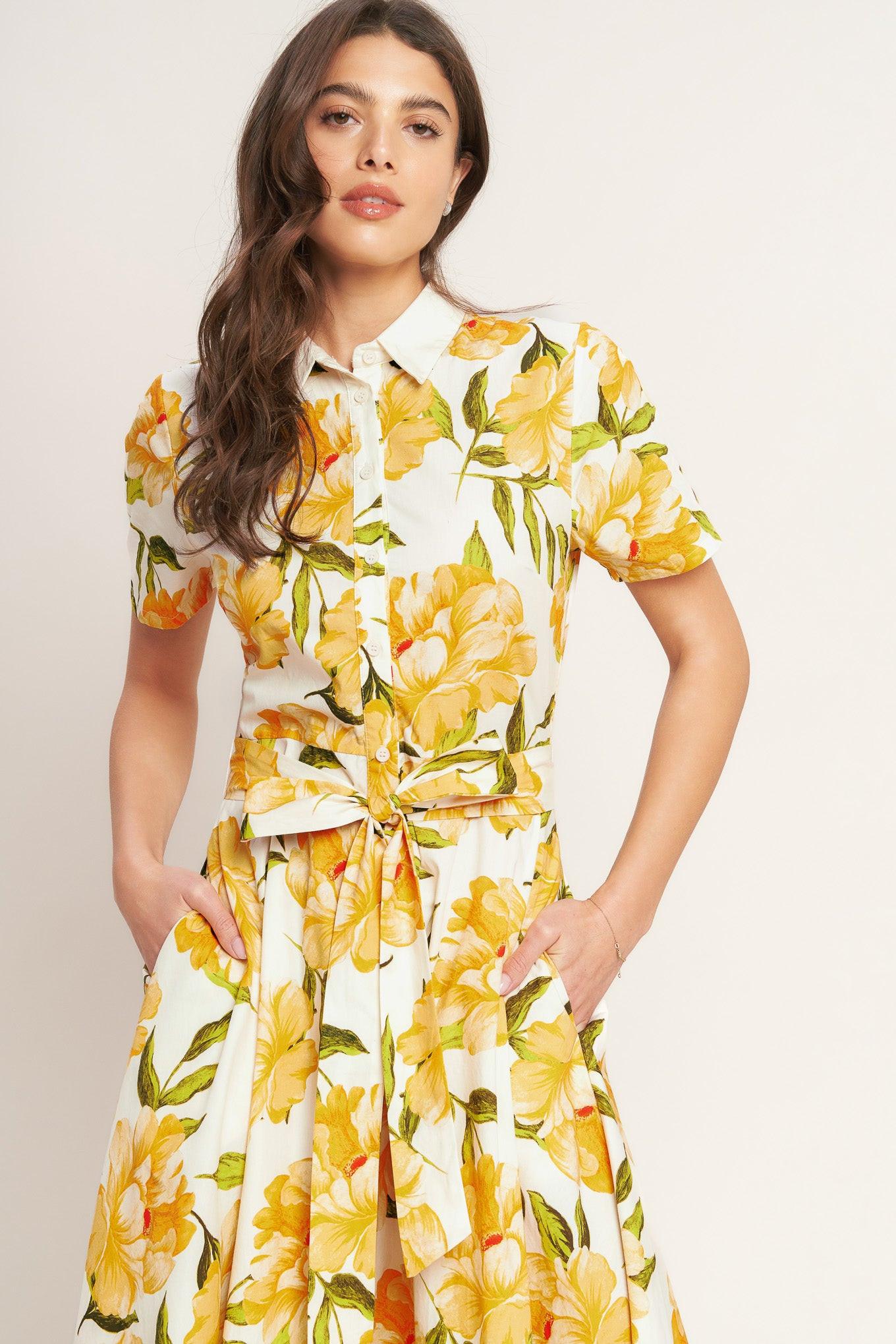 A printed woven midi dress featuring collar, short sleeve, button down, self sash tie and circle skirt
Details:
Self : 100% Cotton
Size & Fit
- Model is 5`8" And Wearing Size Small
- Measurements Taken From Size Small
- Approx. Length: 50" Flying Tomato