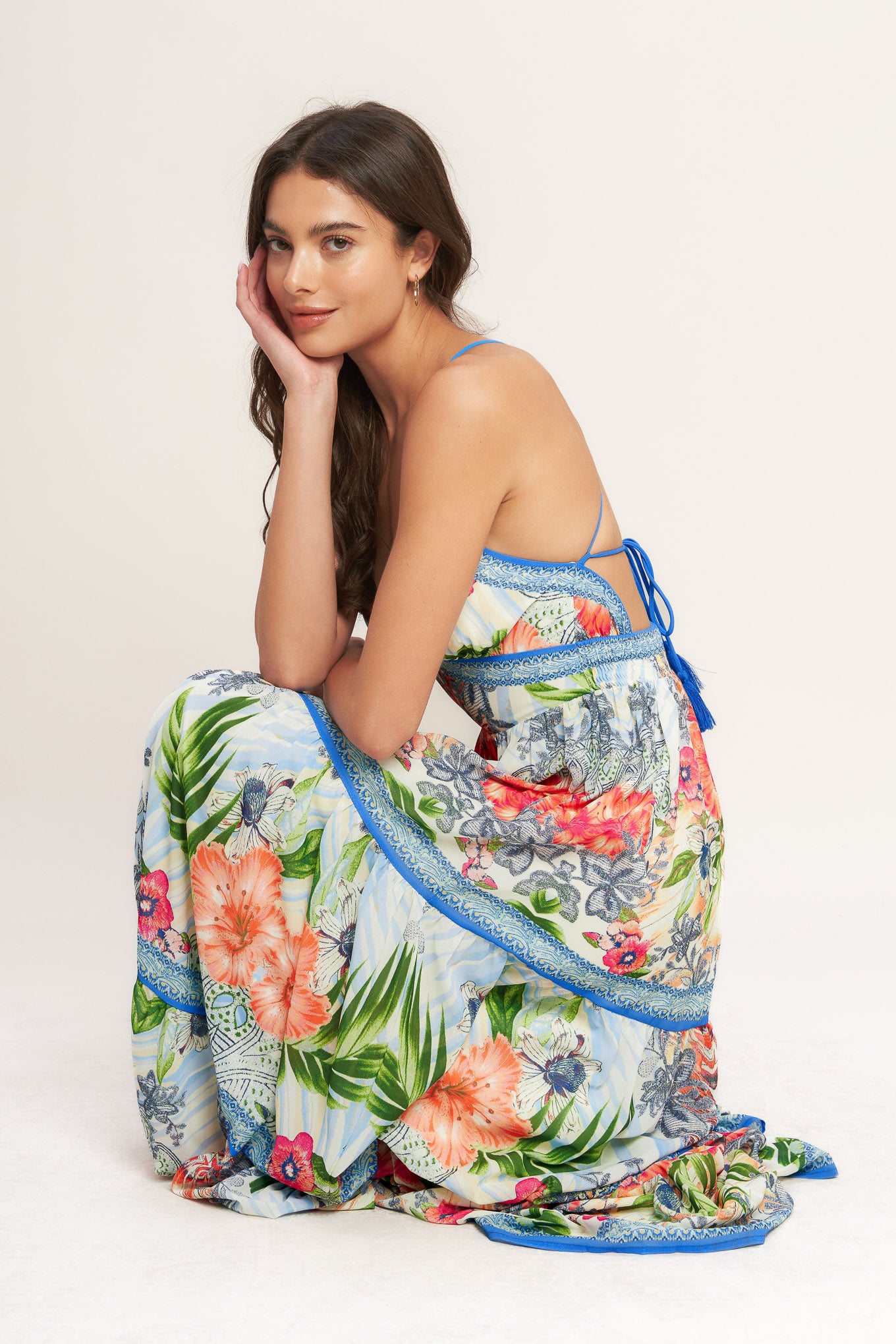 A printed woven maxi dress featuring cami top, waist yoke, tiered skirt, open back with tie and smocked back waist band
Details:
Self : 100% Polyester
Lining : 100% Polyester
Size & Fit
- Model is 5`8" And Wearing Size Small
- Measurements Taken From Size Small
- Approx. Length: 64" Flying Tomato