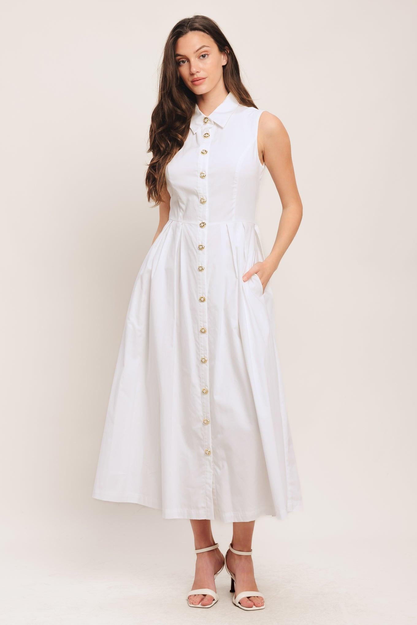 A solid woven midi dress featuring collar, sleeveless, jewel button down, self belt, side pocket and full skirt
Details:
Self: 100% Cotton
Lining: 100% Polyester
Size & Fit
-Model is 5`8" And Wearing Size Small
-Measurements Taken From Size Small
-Approx. Length: 50"