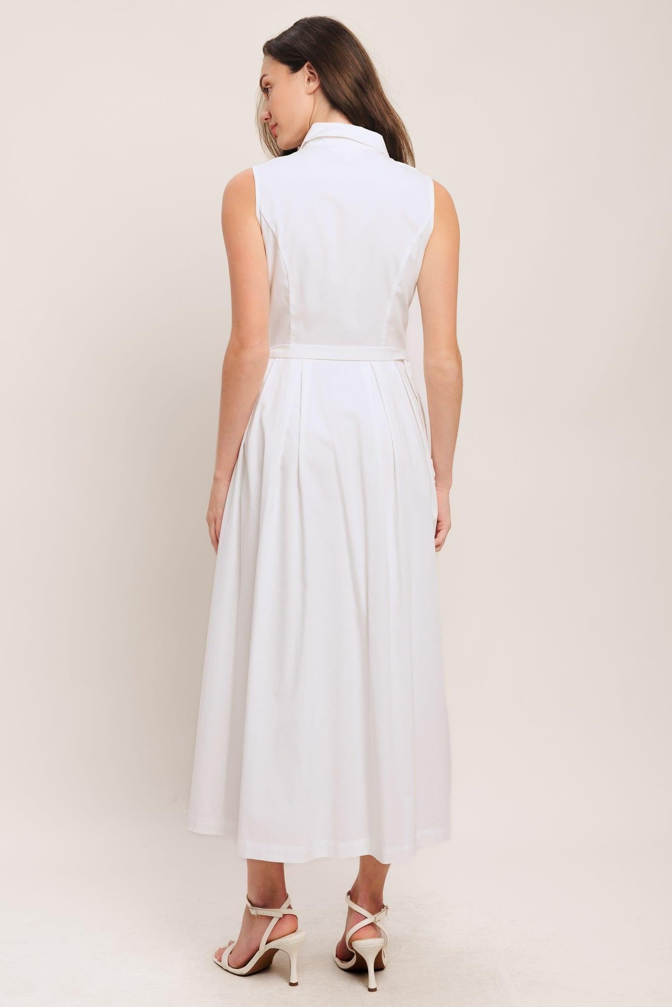 A solid woven midi dress featuring collar, sleeveless, jewel button down, self belt, side pocket and full skirt
Details:
Self: 100% Cotton
Lining: 100% Polyester
Size & Fit
-Model is 5`8" And Wearing Size Small
-Measurements Taken From Size Small
-Approx. Length: 50"