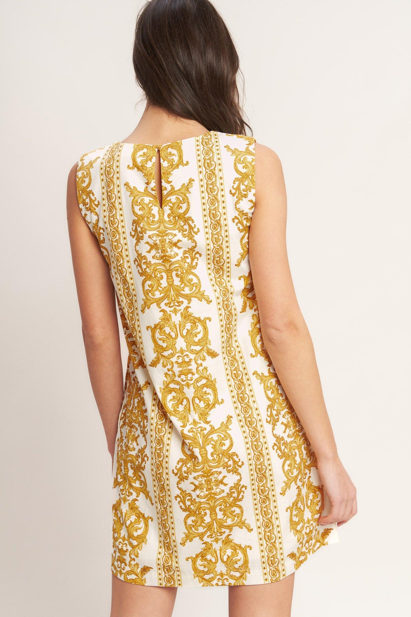 A printed woven mini shift dress featuring round neckline and back button closure
Details:
Self : 100% Cotton
Lining : 100% Polyester
Size & Fit
- Model is 5`8" And Wearing Size Small
- Measurements Taken From Size Small
- Approx. Length: 35" FLYING TOMATO