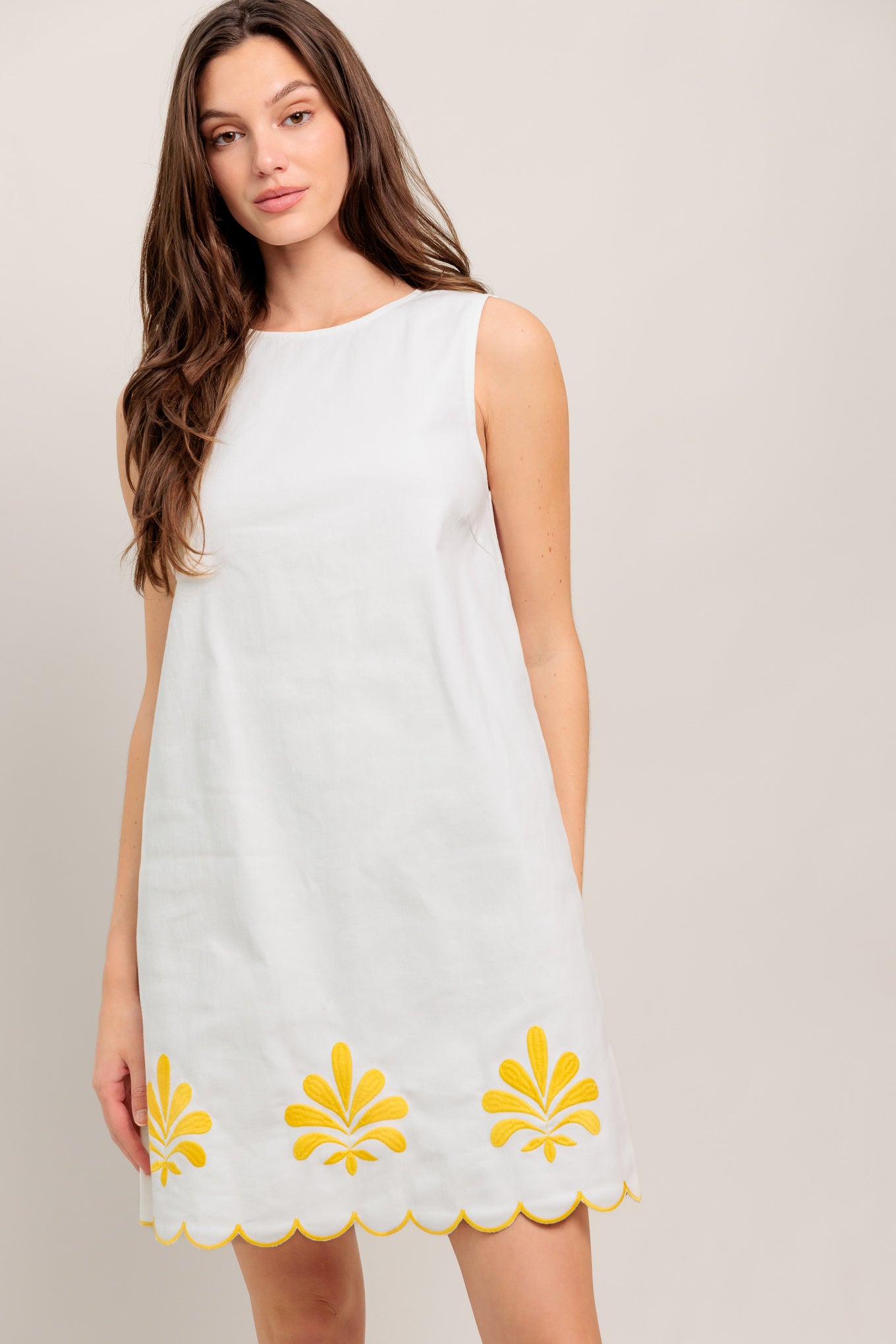 A solid woven mini dress featuring round neckline, sleeveless, embroidered scallop hem and back zipper closure
Details:
Self : 97% Cotton 3% Spandex
Size & Fit
- Model is 5`8" And Wearing Size Small
- Measurements Taken From Size Small
- Approx. Length: 35" Flying Tomato