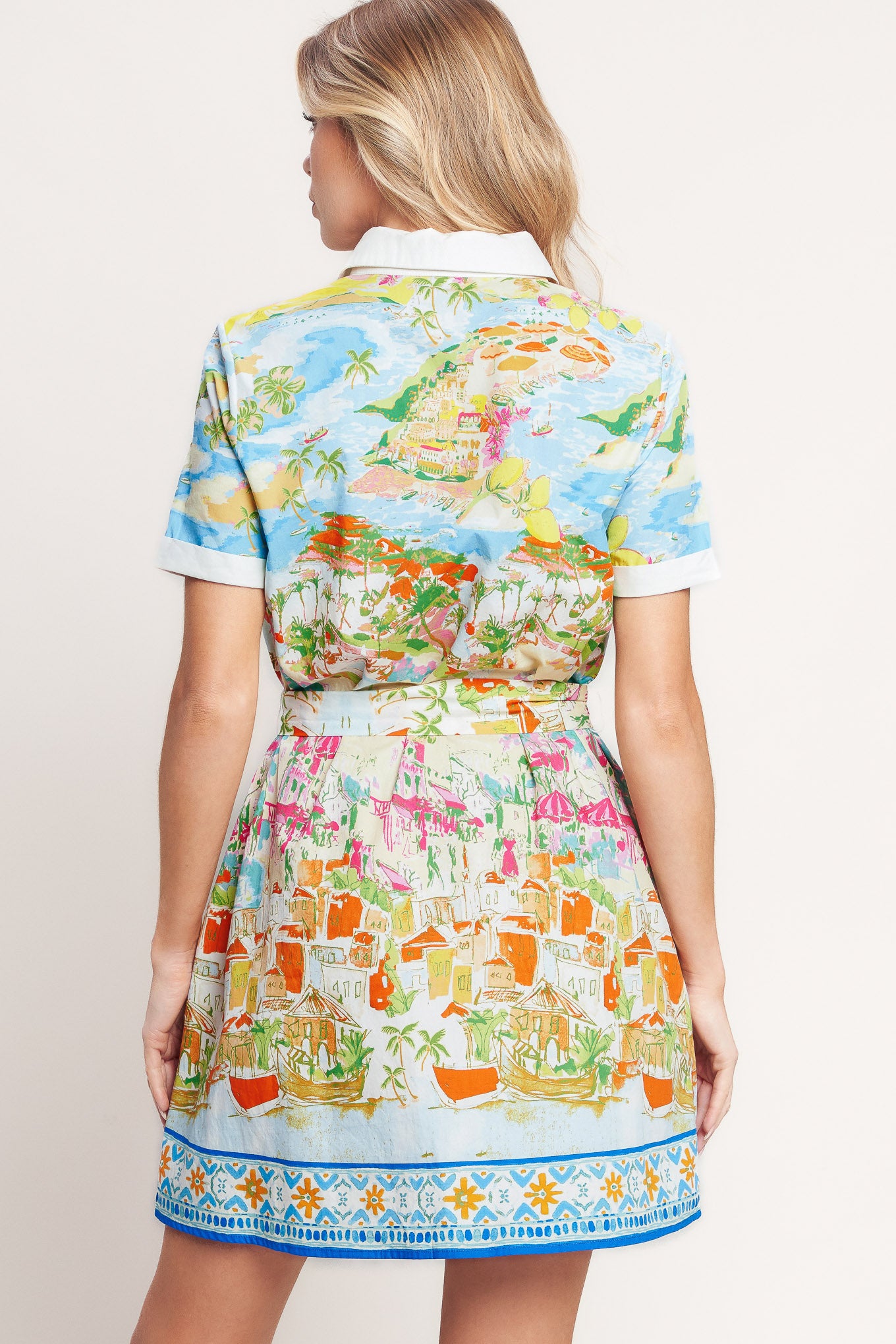 A printed woven mini dress featuring collar, hidden button down, short sleeve and self sash tie
Details:
Self: 100% Cotton
Size & Fit
-Model is 5`8" And Wearing Size Small
-Measurements Taken From Size Small
-Approx. Length: 36"