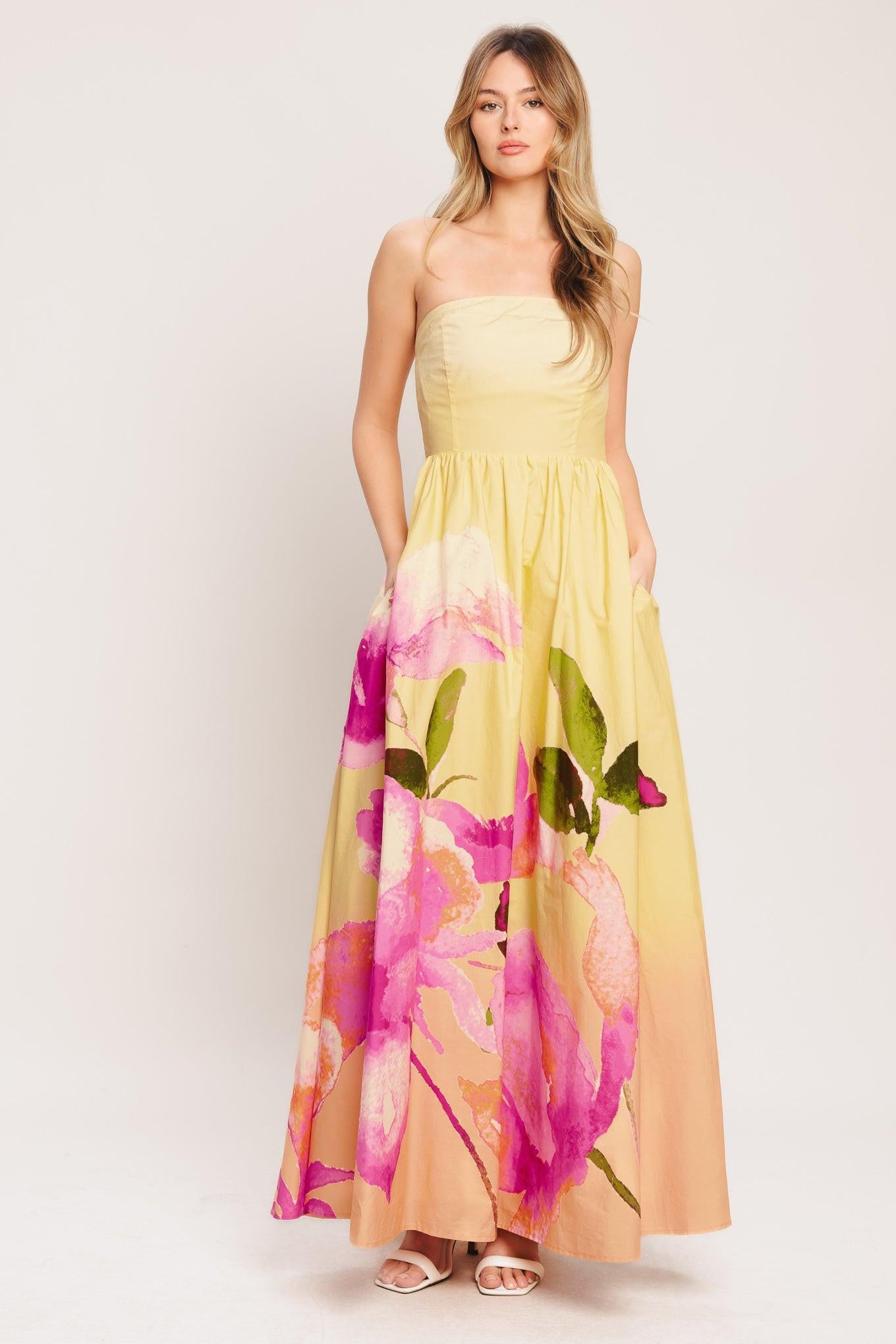 A printed woven maxi dress featuring strapless, full skirt and smocked back bodice
Details:
Self: 100% Cotton
Lining: 100% Polyester
Size & Fit
-Model is 5`8" And Wearing Size Small
-Measurements Taken From Size Small
-Approx. Length: 53"