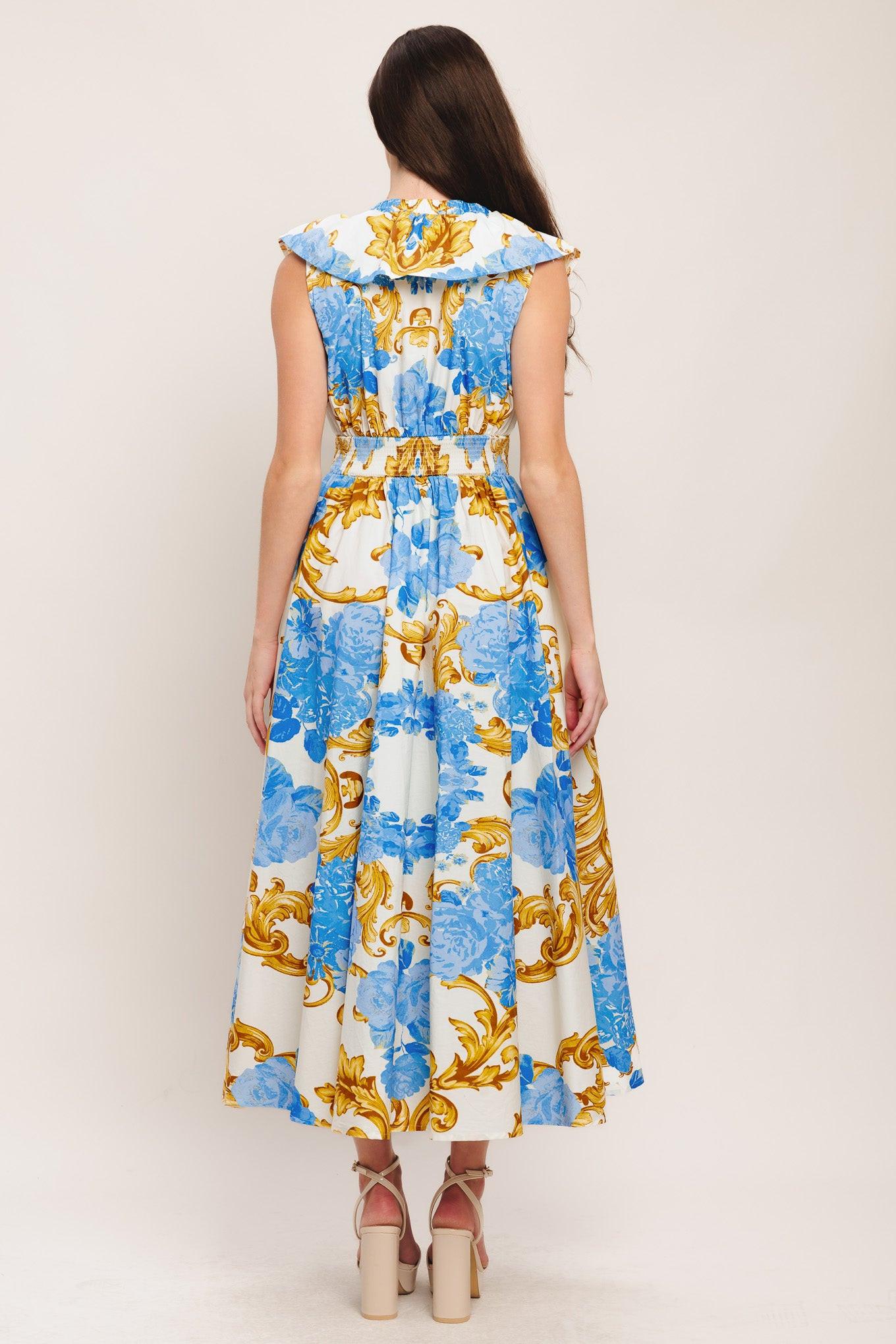 A printed woven midi dress featuring V neckline, ruffle collar, waist yoke, full skirt and smocked back waistband
Details:
Self: 100% Cotton
Size & Fit
-Model is 5`8" And Wearing Size Small
-Measurements Taken From Size Small
-Approx. Length: 53"
