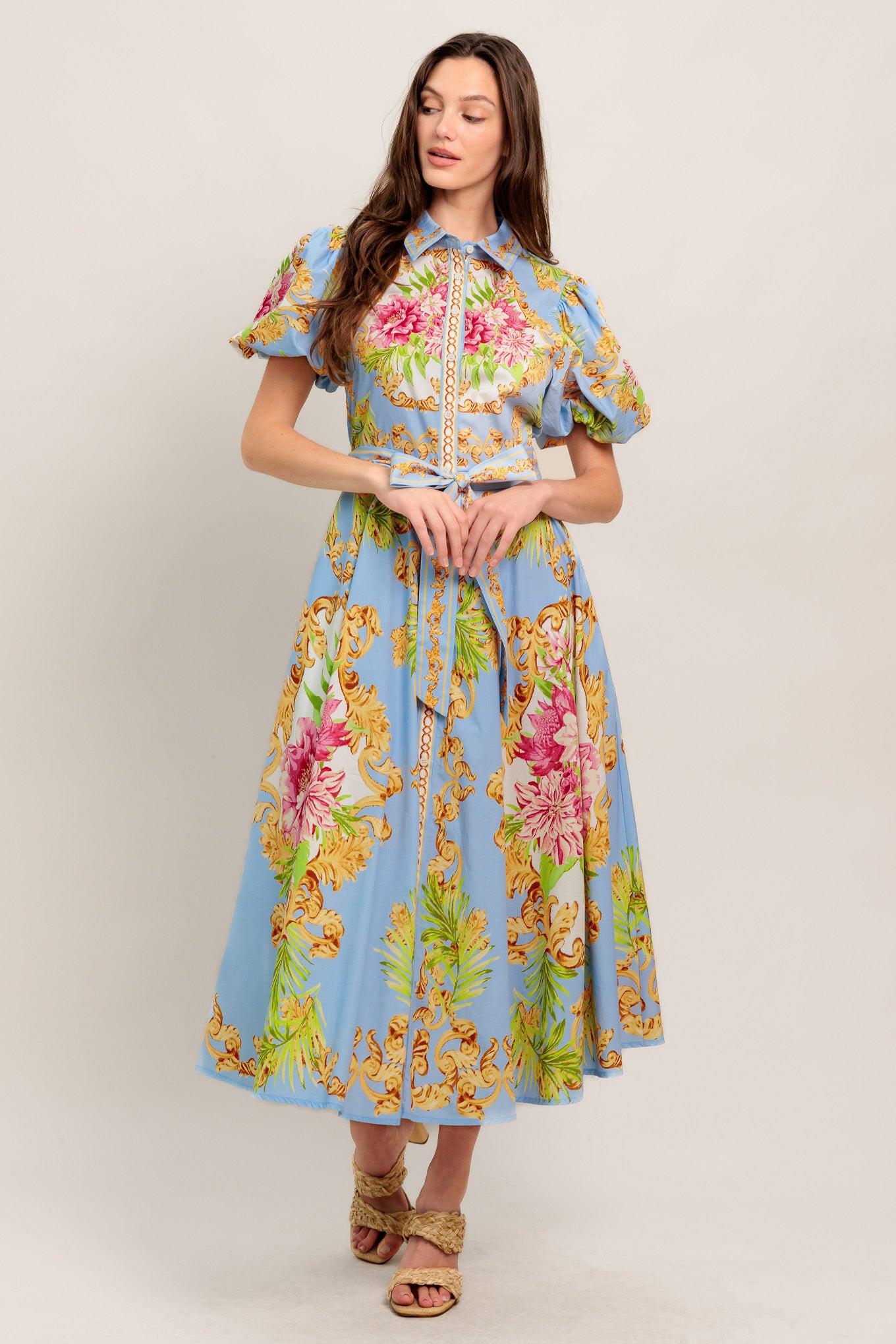 A printed woven midi dress featuring collar, front button down, short puff sleeve, self sash tie and circle skirt
Details:
Self : 100% Cotton
Lining : 100% Polyester
Size & Fit
- Model is 5`8" And Wearing Size Small
- Measurements Taken From Size Small
- Approx. Length: 51" Flying Tomato