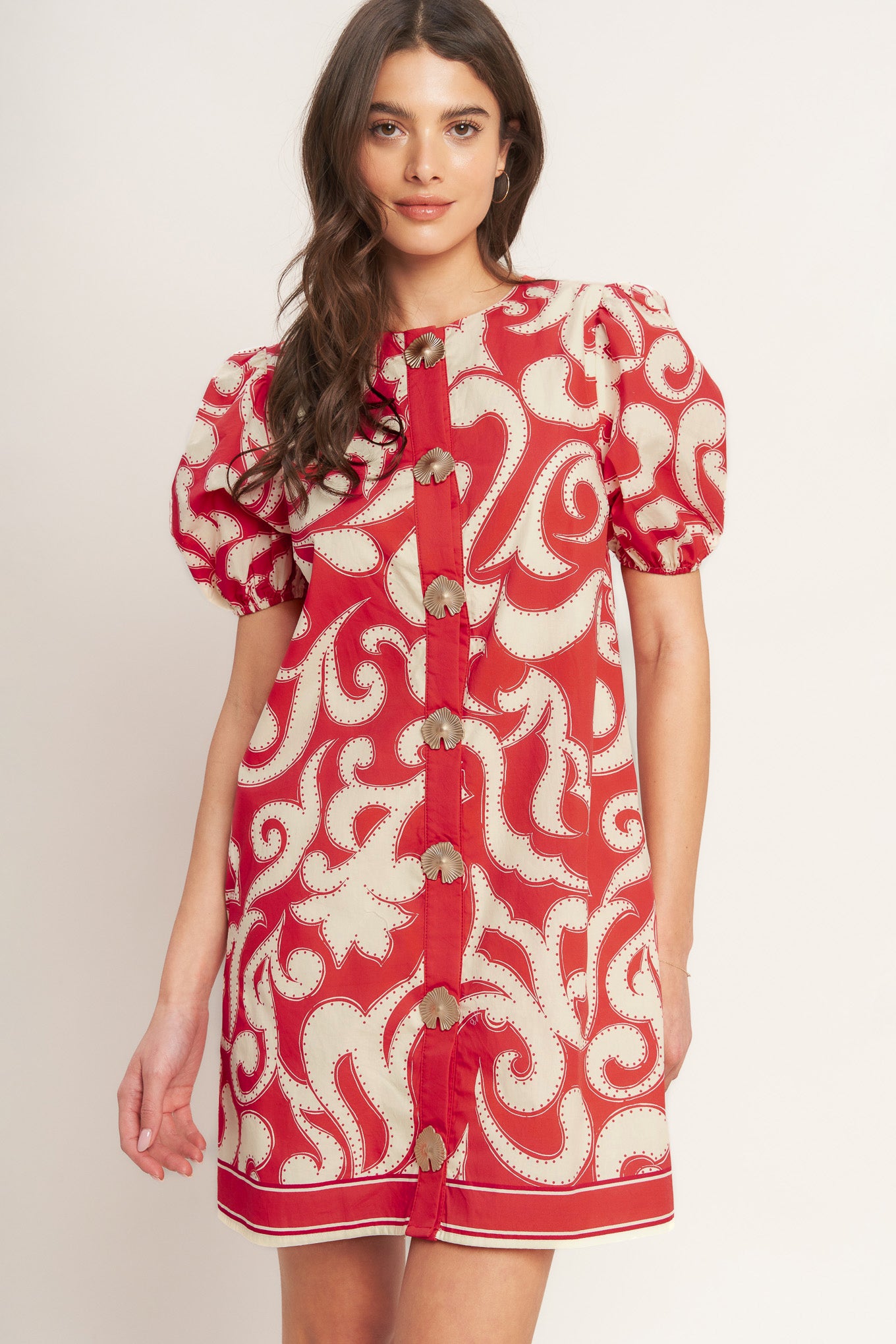 A printed woven mini dress featuring round neckline, short puff sleeve and front button down closure
Details:
Self : 100% Cotton
Lining : 100% Polyester
Size & Fit
- Model is 5`8" And Wearing Size Small
- Measurements Taken From Size Small
- Approx. Length: 36" FLYING TOMATO