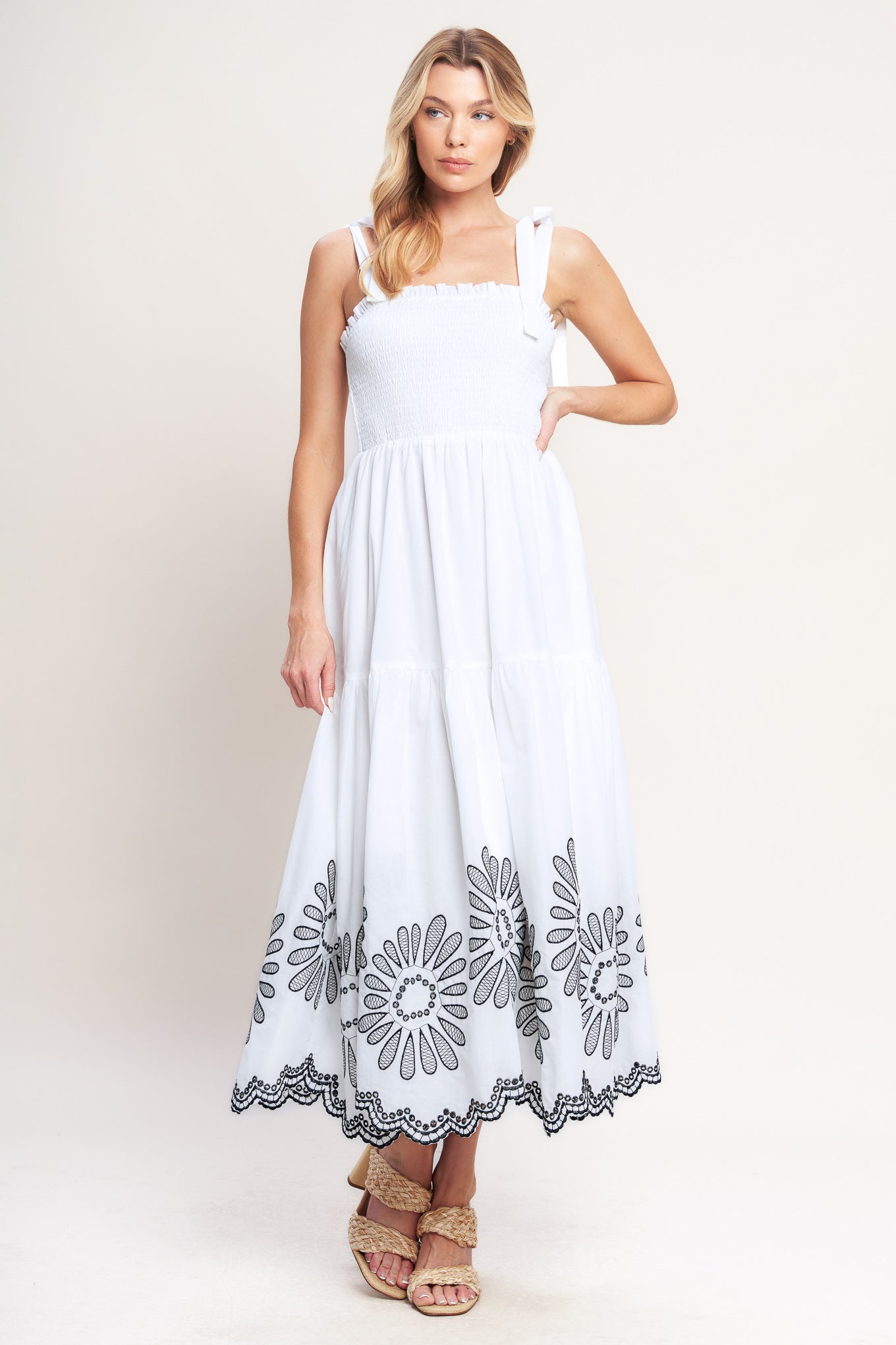 A solid woven midi dress featuring contrasting ruffle edge, shoulder tie and embroidered skirt
Details:
Self: 100% Cotton
Lining: 100% Polyester
Size & Fit
-Model is 5`8" And Wearing Size Small
-Measurements Taken From Size Small
-Approx. Length: 50"