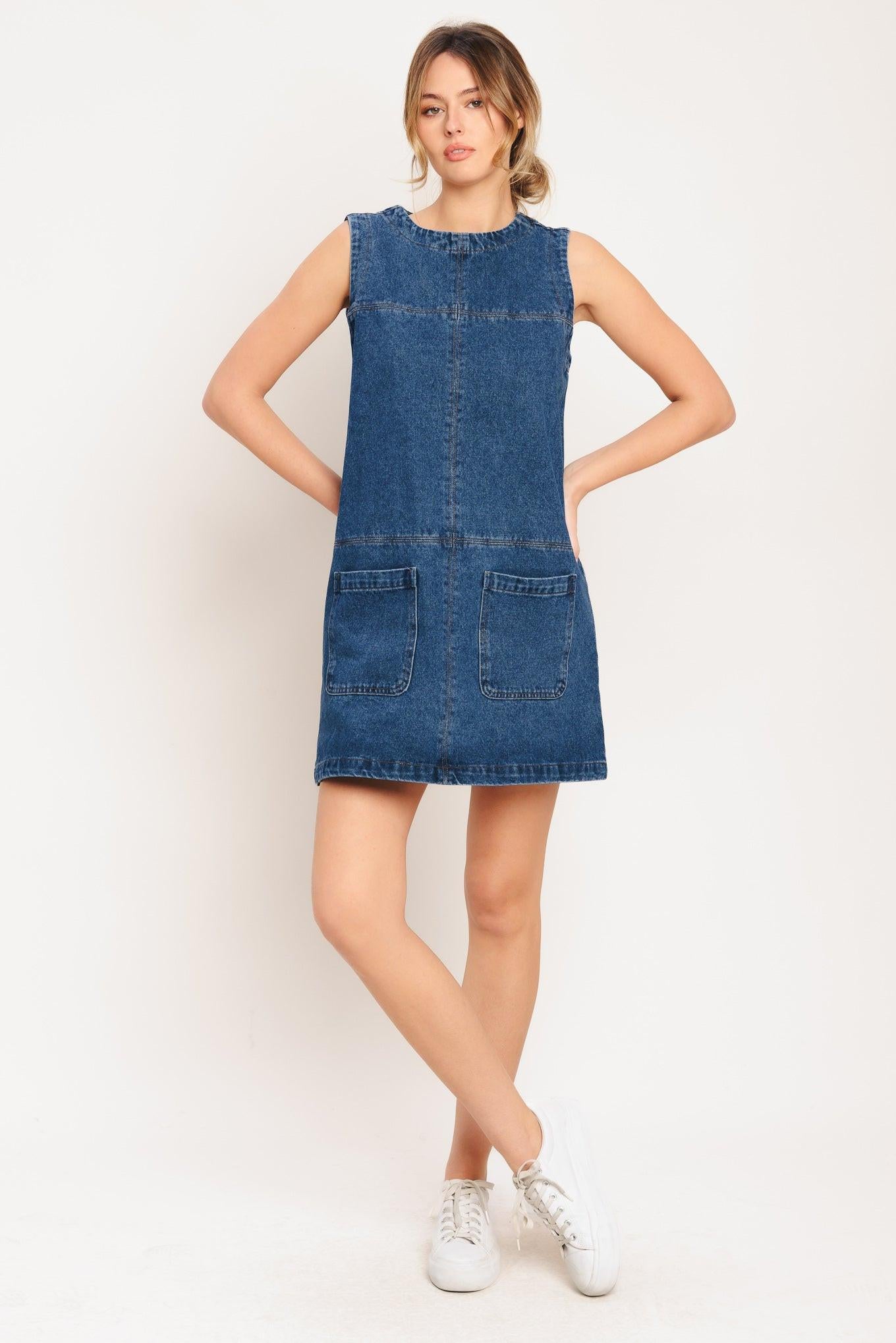 A washed denim shift dress with round neckline, sleeveless, pockets and back zipper closure
Details:
Self: 90% Cotton 10% Polyester
Size & Fit
-Model is 5`8" And Wearing Size Small
-Measurements Taken From Size Small
-Approx. Length: 34"