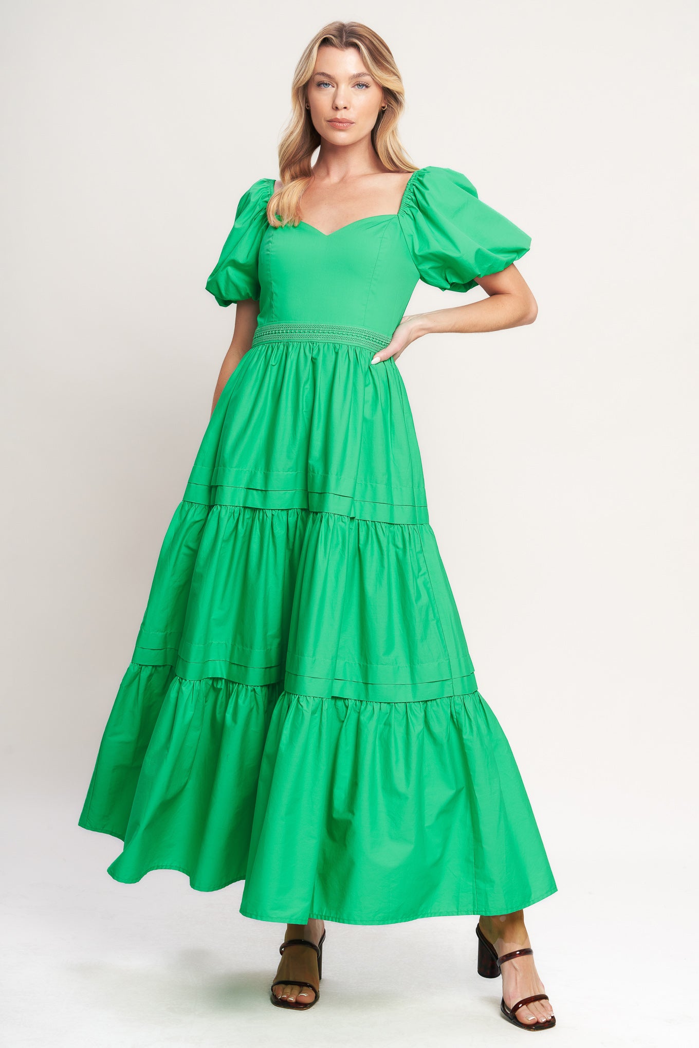 A solid woven maxi dress featuring sweetheart neckline, short puff sleeve, lace contrast waistband, tiered skirt and back zipper closure
Details:
Self: 100% Cotton
Lining: 100% Polyester
Size & Fit
-Model is 5`8" And Wearing Size Small
-Measurements Taken From Size Small
-Approx. Length: 54"